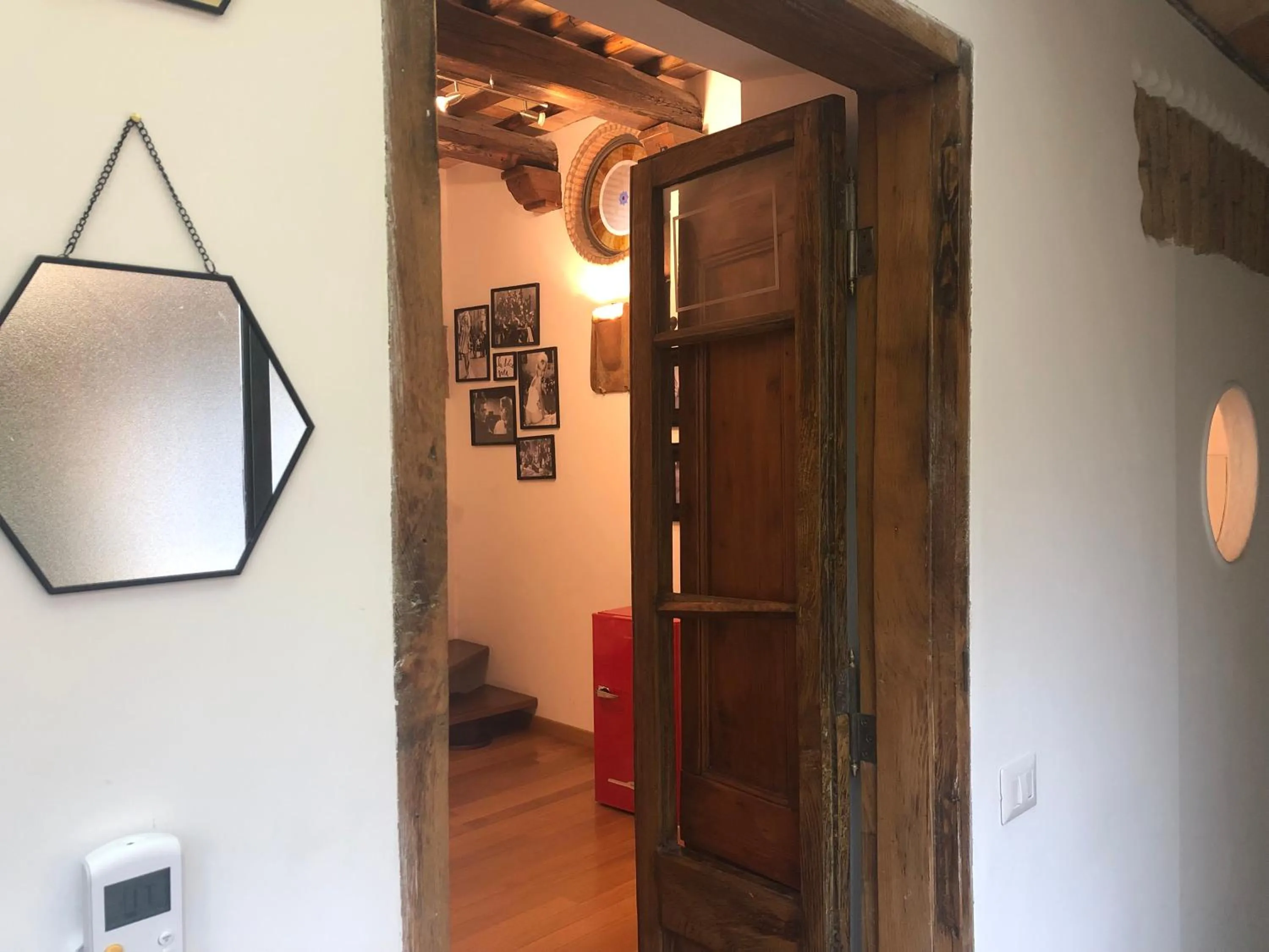 Communal lounge/ TV room in Giuturna Boutique Hotel