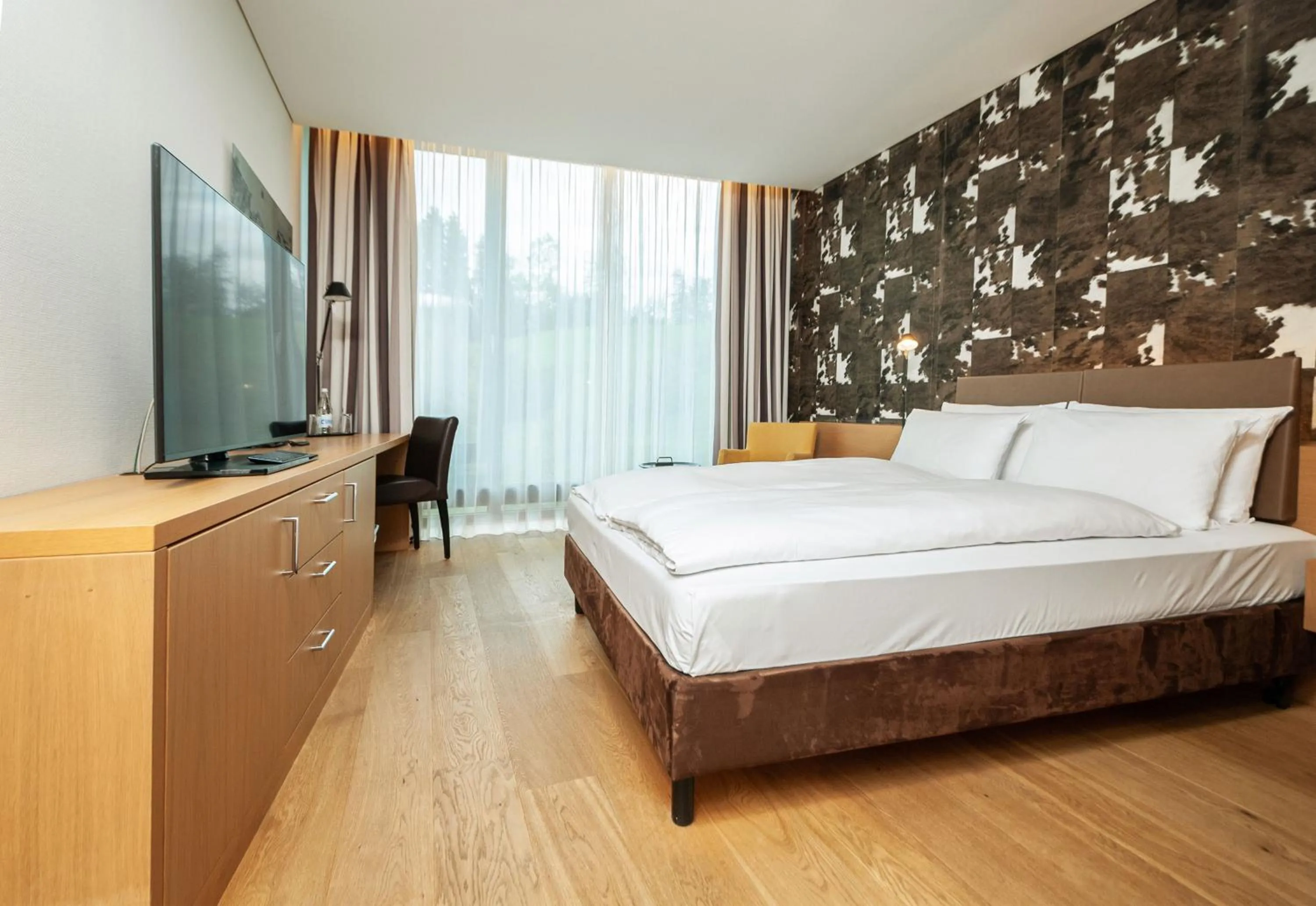 Bedroom, Bed in Tailormade Hotel SIHLPARK Schindellegi