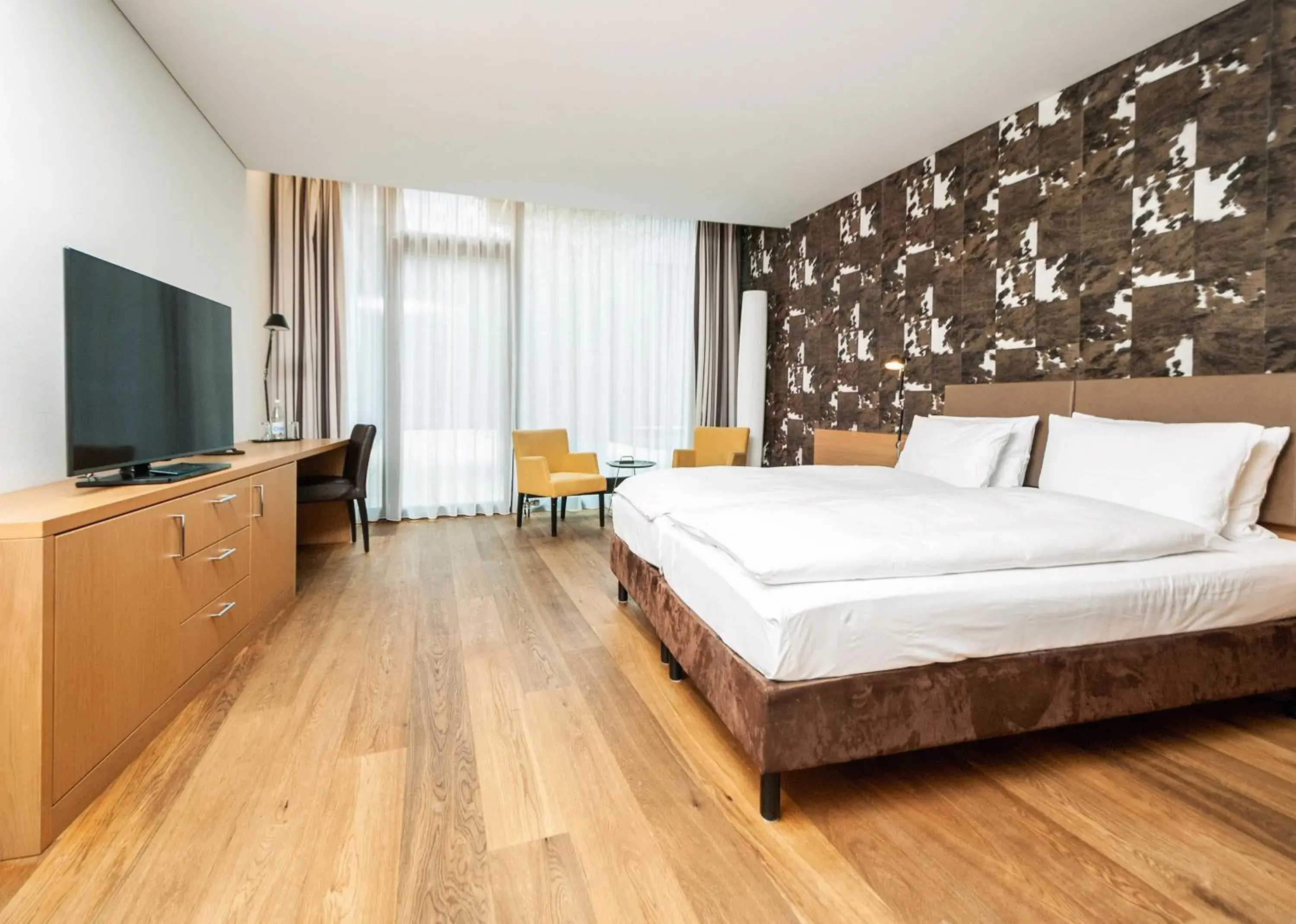 Bedroom, Bed in Tailormade Hotel SIHLPARK Schindellegi Bedroom, Bed in Tailormade Hotel SIHLPARK Schindellegi