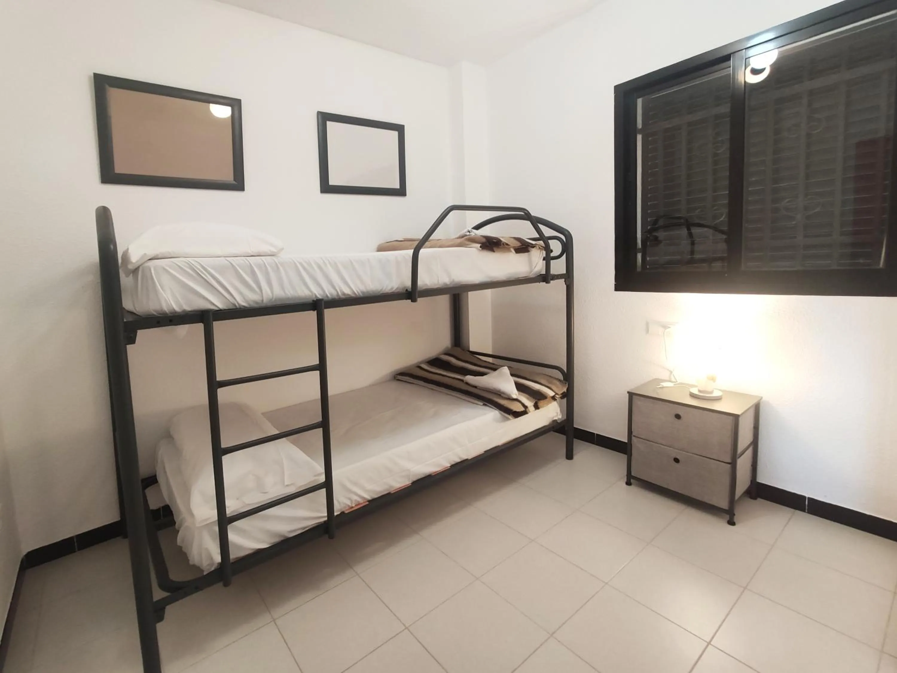 Bed in Apartamentos Surfing 3000