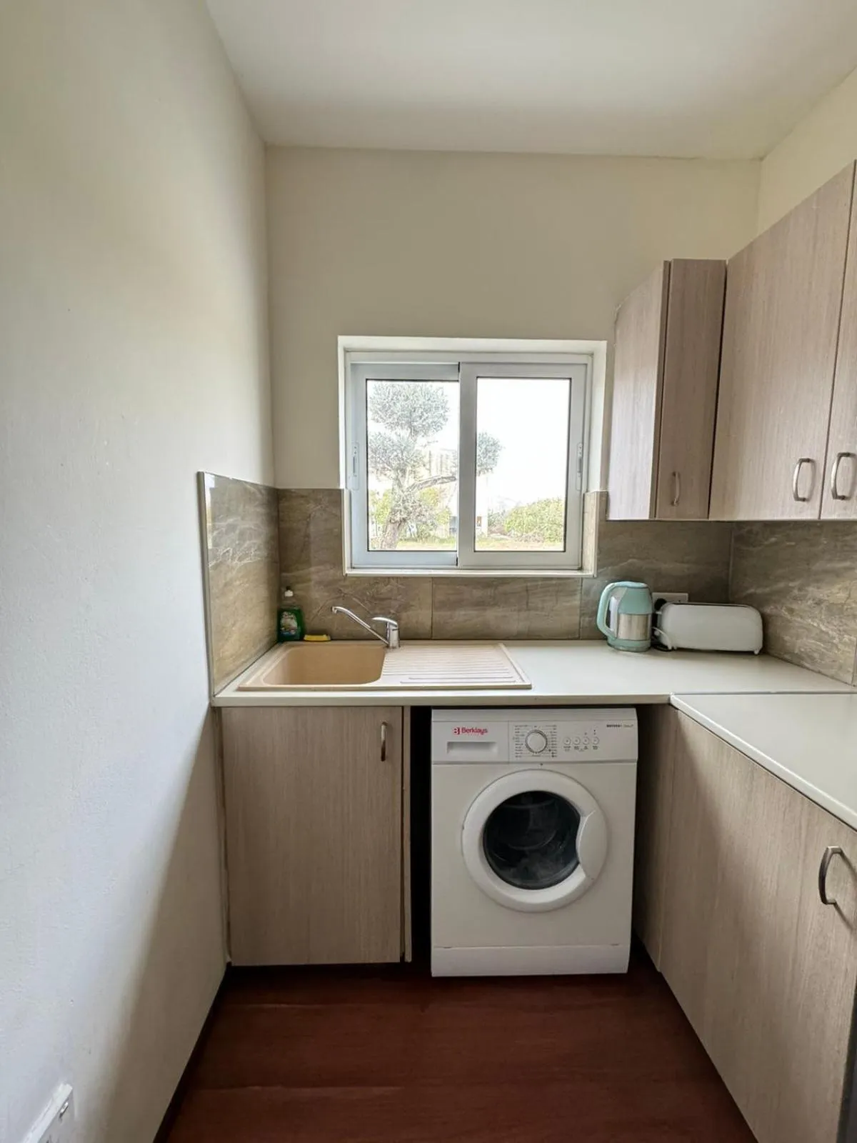 washing machine in Sea Apartments