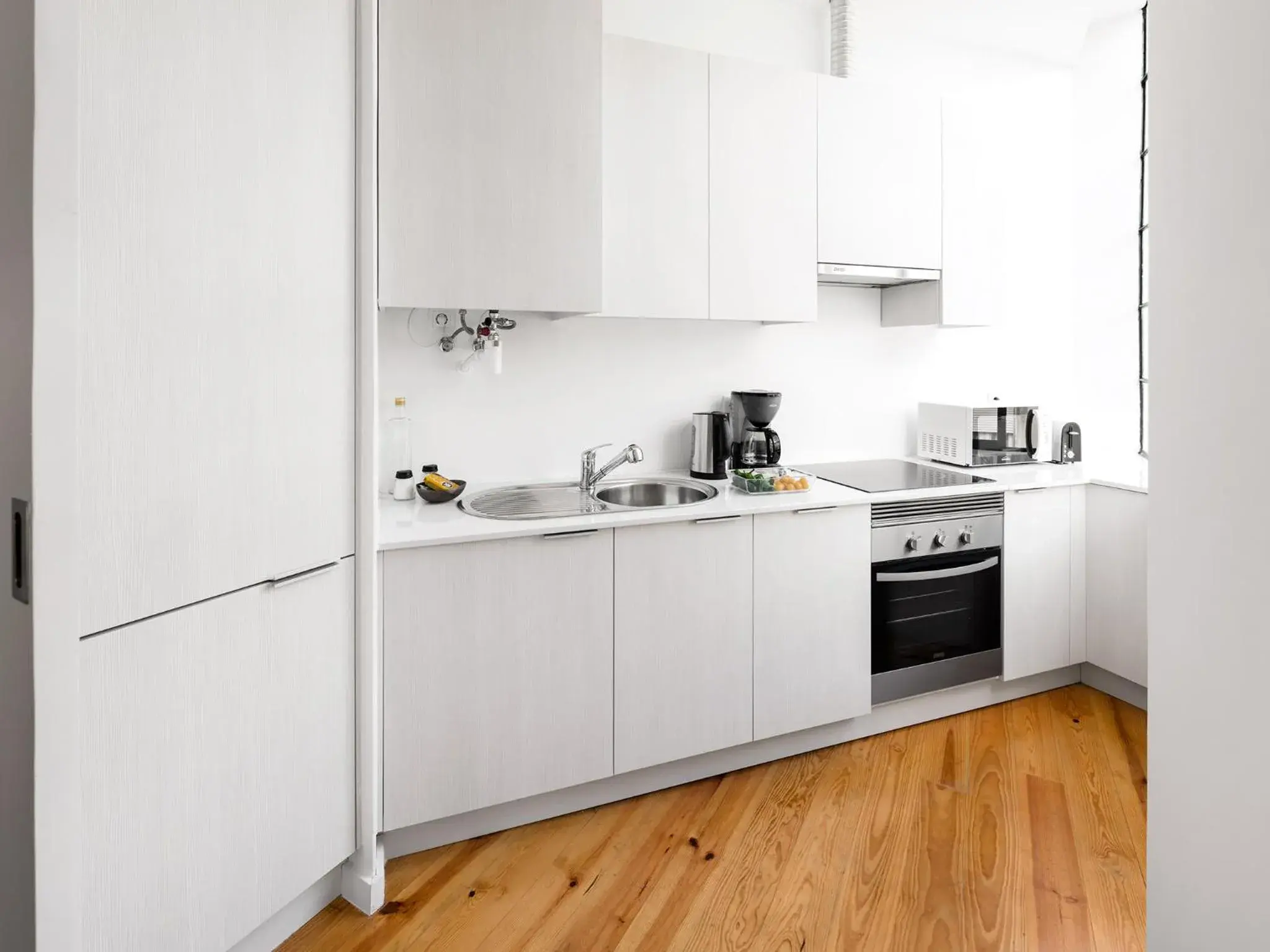 Kitchen or kitchenette in Lisbon Serviced Apartments - Castelo S. Jorge Kitchen or kitchenette in Lisbon Serviced Apartments - Castelo S. Jorge