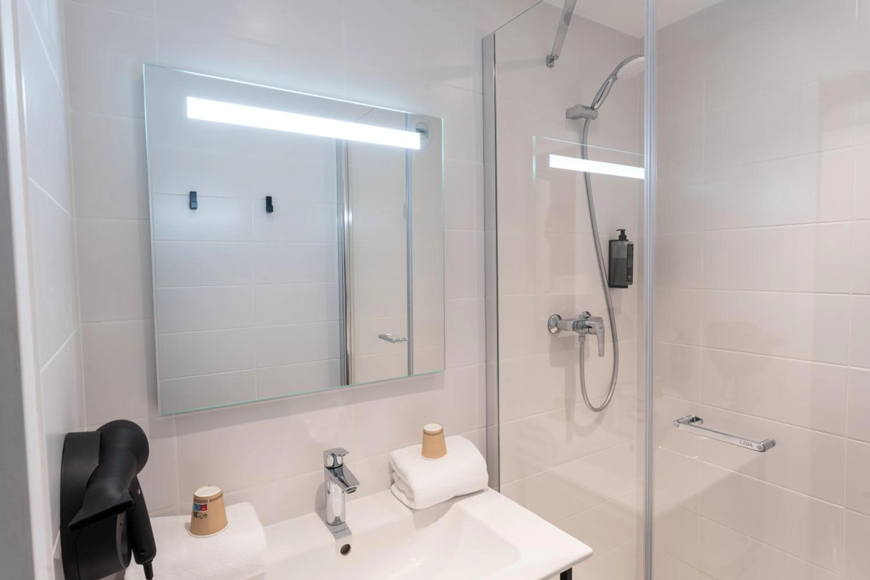 Shower in Hotel Ibis Budget Rennes Cesson