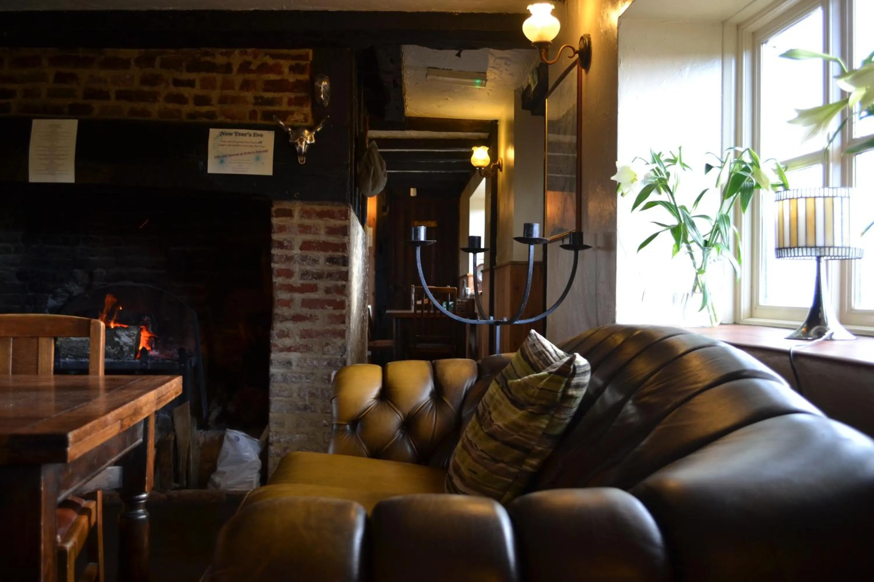 Communal lounge/ TV room in The Bowl Inn