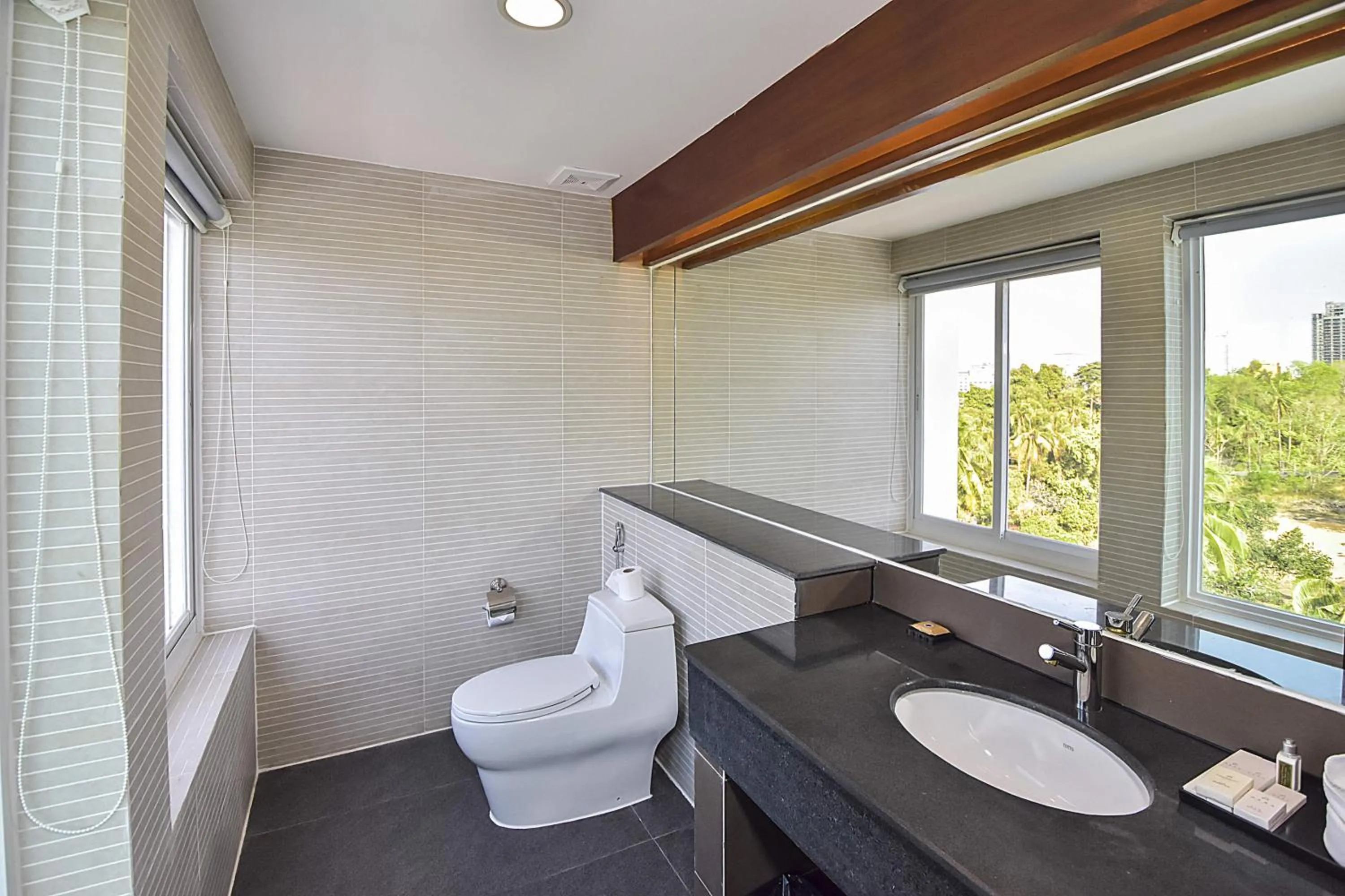 Toilet in Independence Hotel Resort & Spa