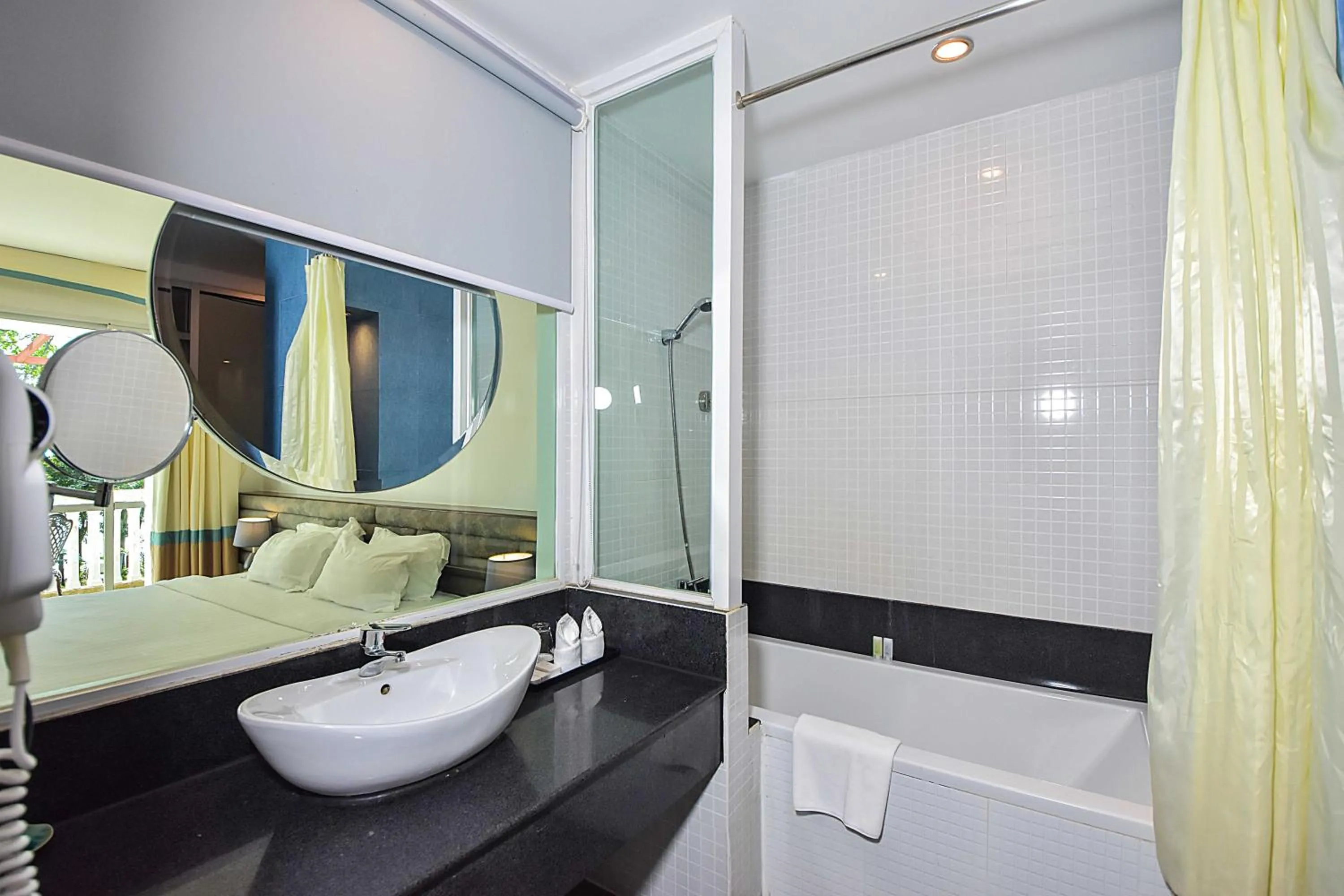 Shower in Independence Hotel Resort & Spa