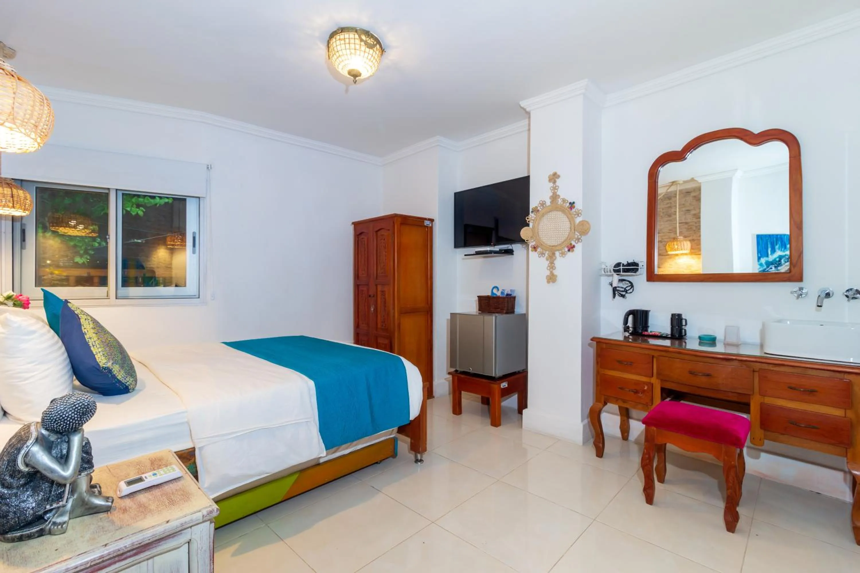 Bed in Voilá Signature Casa Isabel