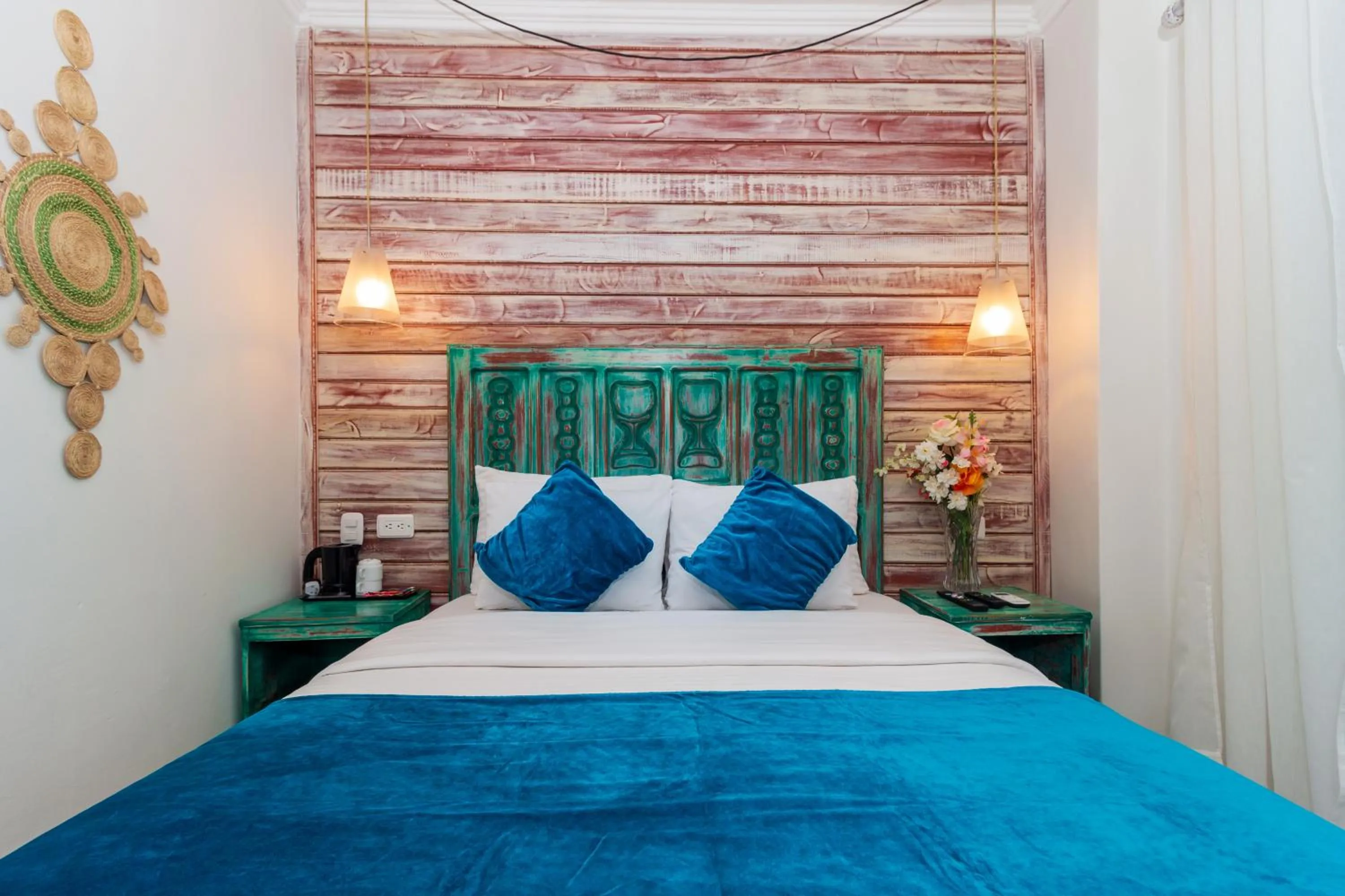 Bed in Voilá Signature Casa Isabel