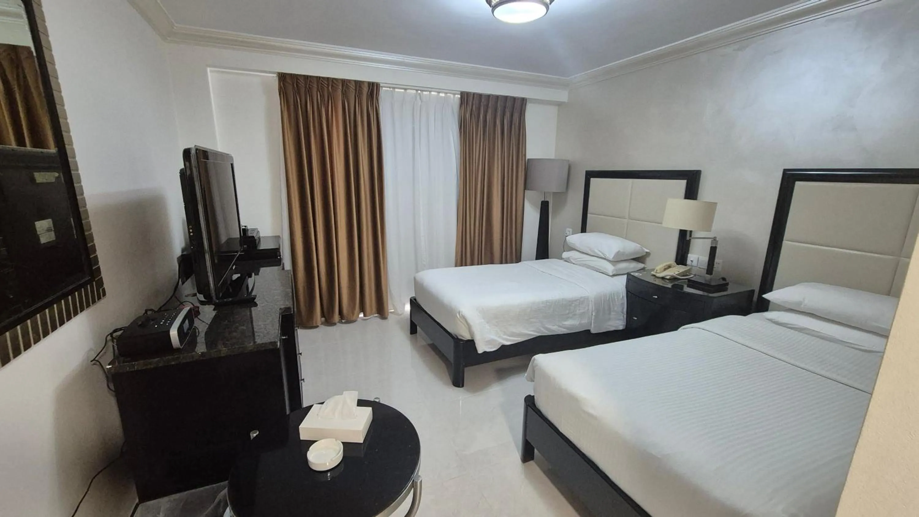 Bed in Le Vendome Hotel