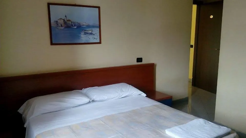 Bed in Hotel Greco