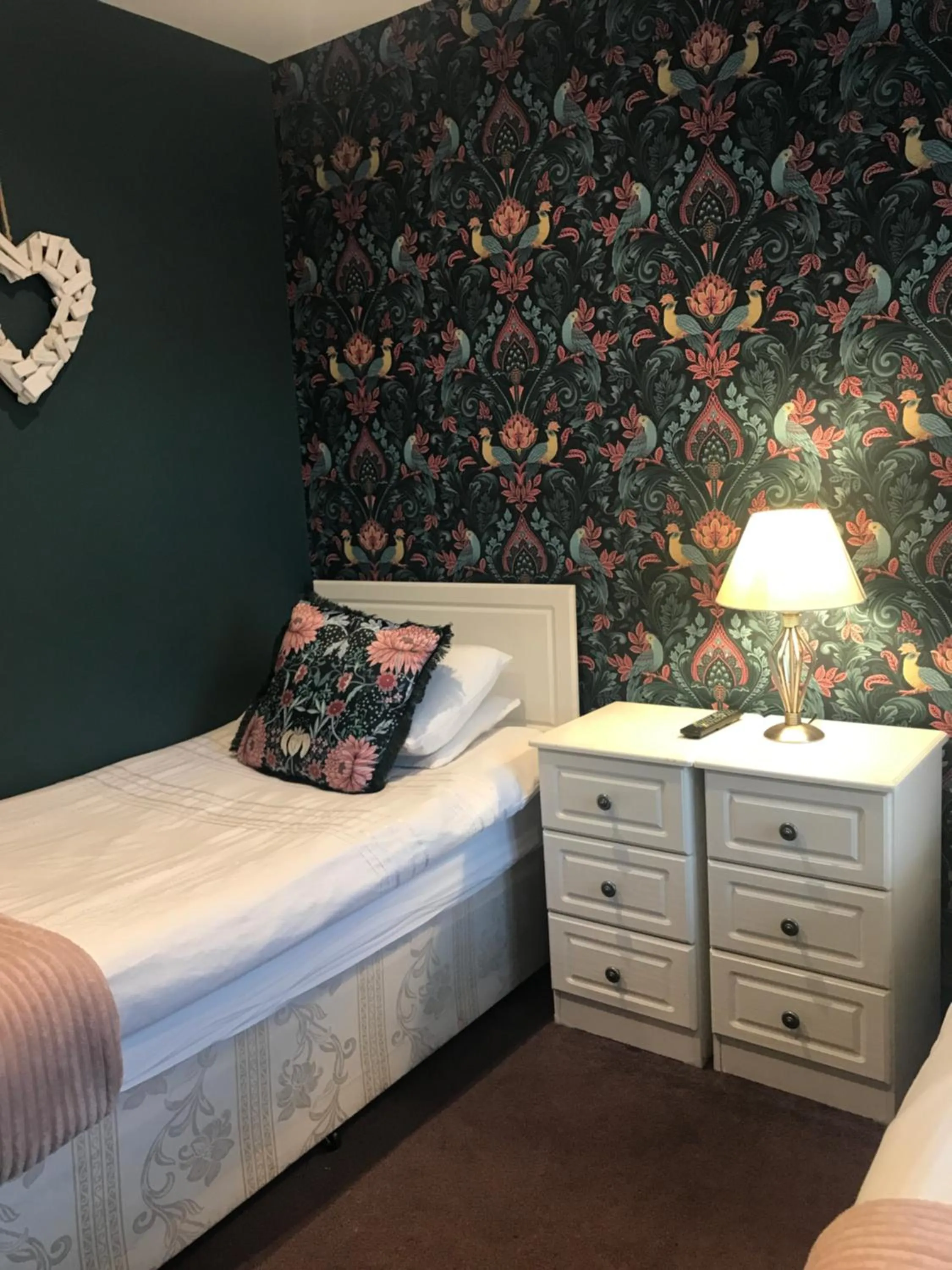 Bed in Acacia Villas Guest House