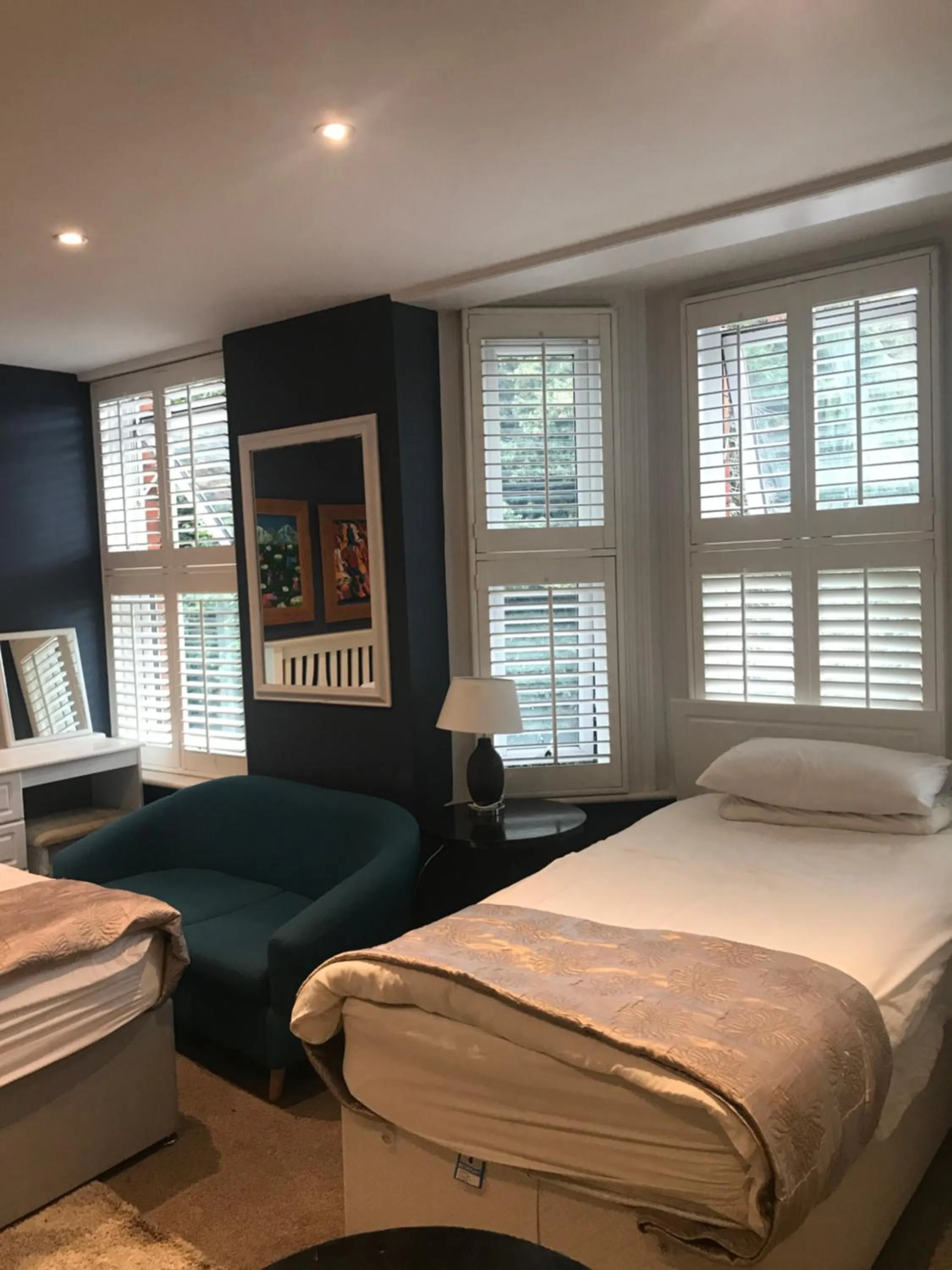 Bed in Acacia Villas Guest House