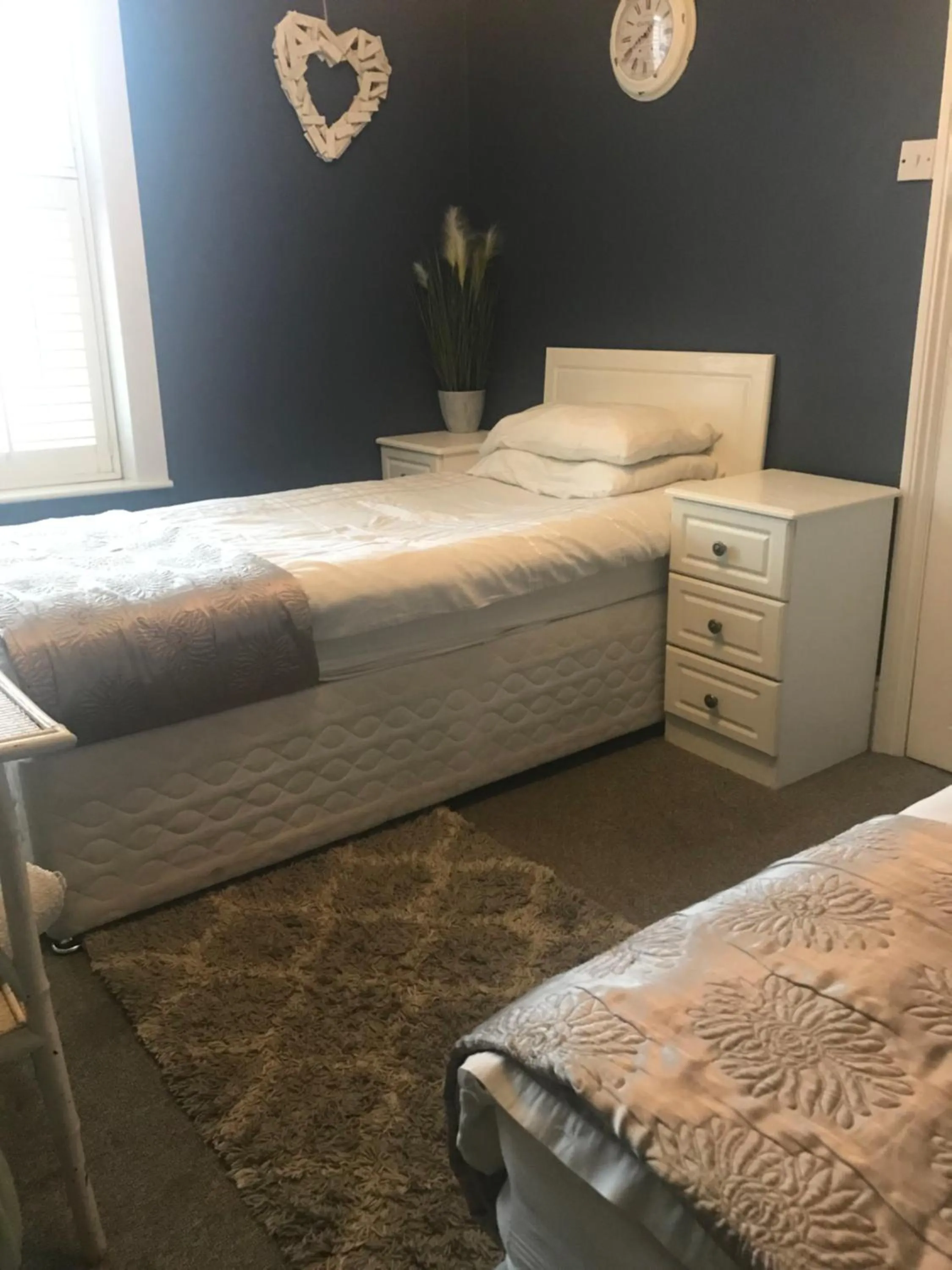 Bed in Acacia Villas Guest House