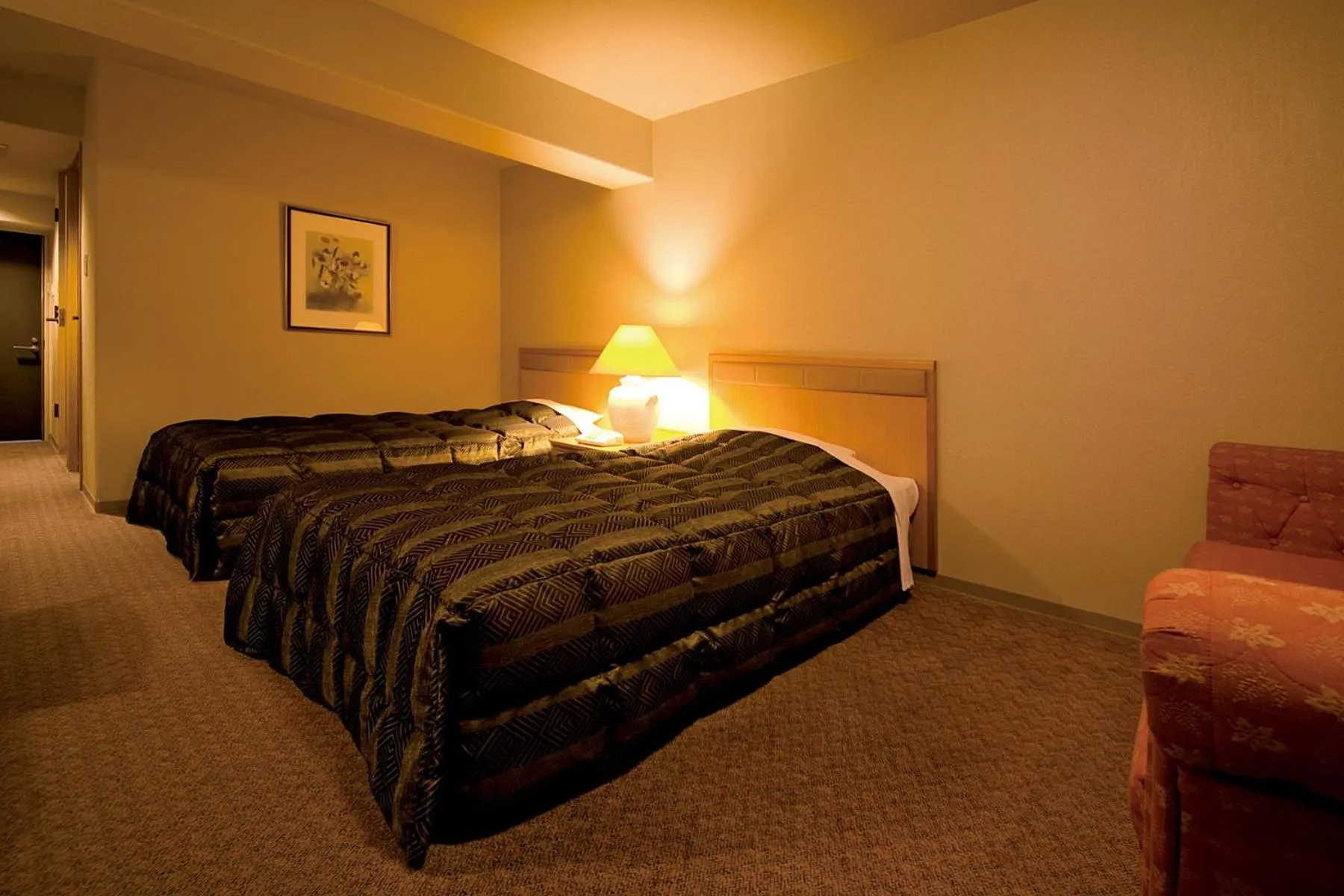 Bed in Hyper Resort Villa Shionoe