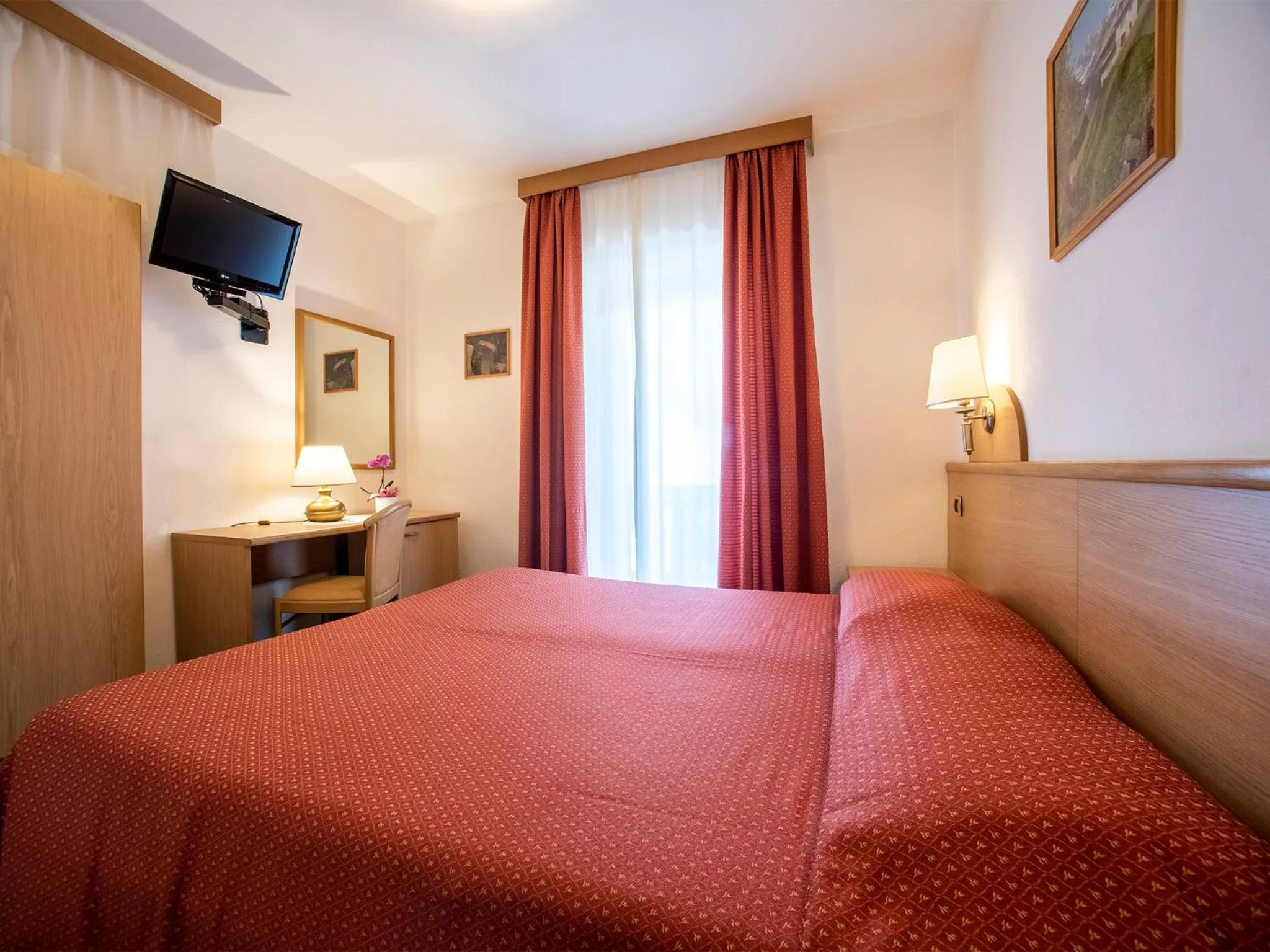 TV and multimedia, Bed in Hotel Adriana