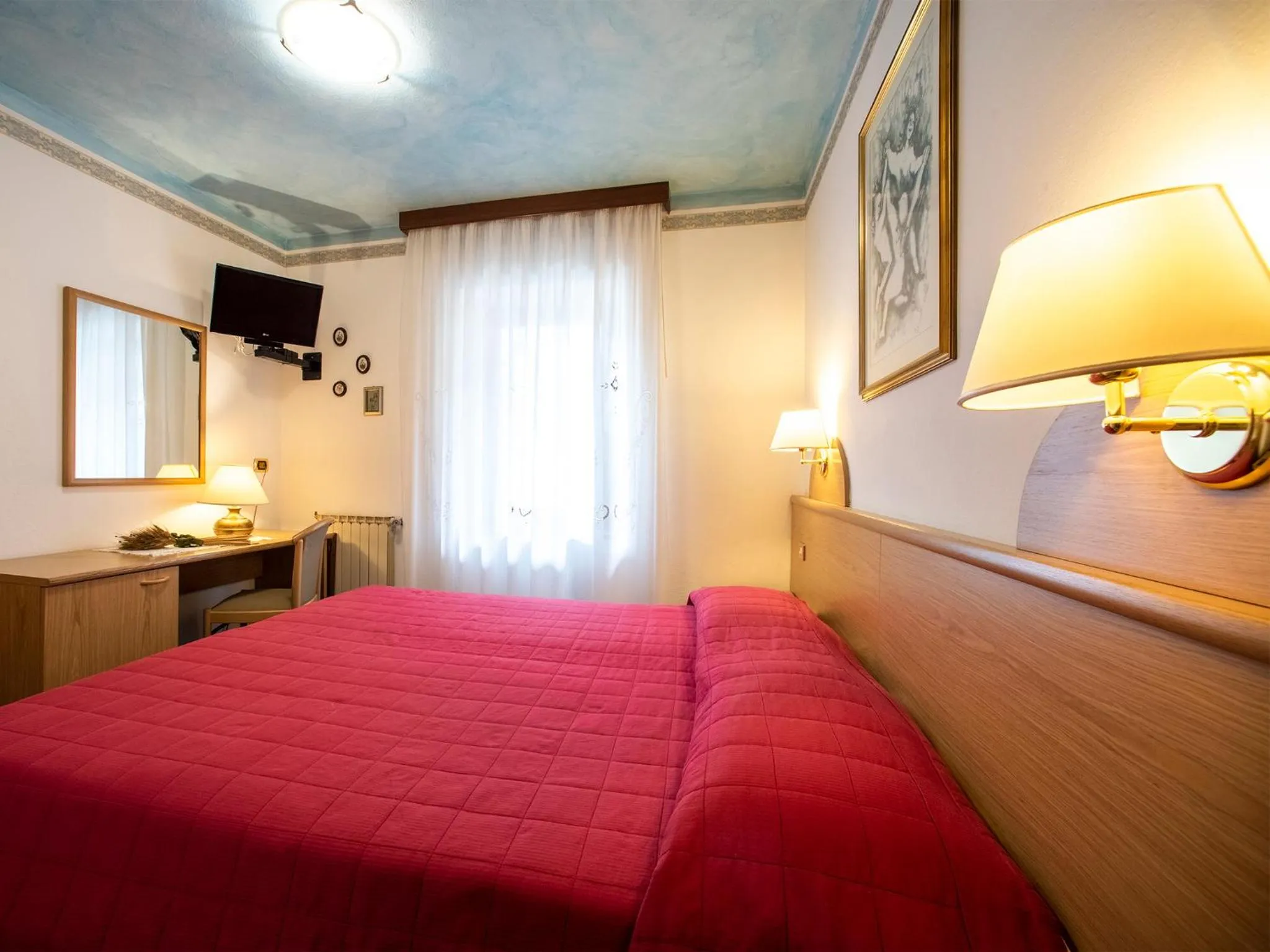 Bed in Hotel Adriana