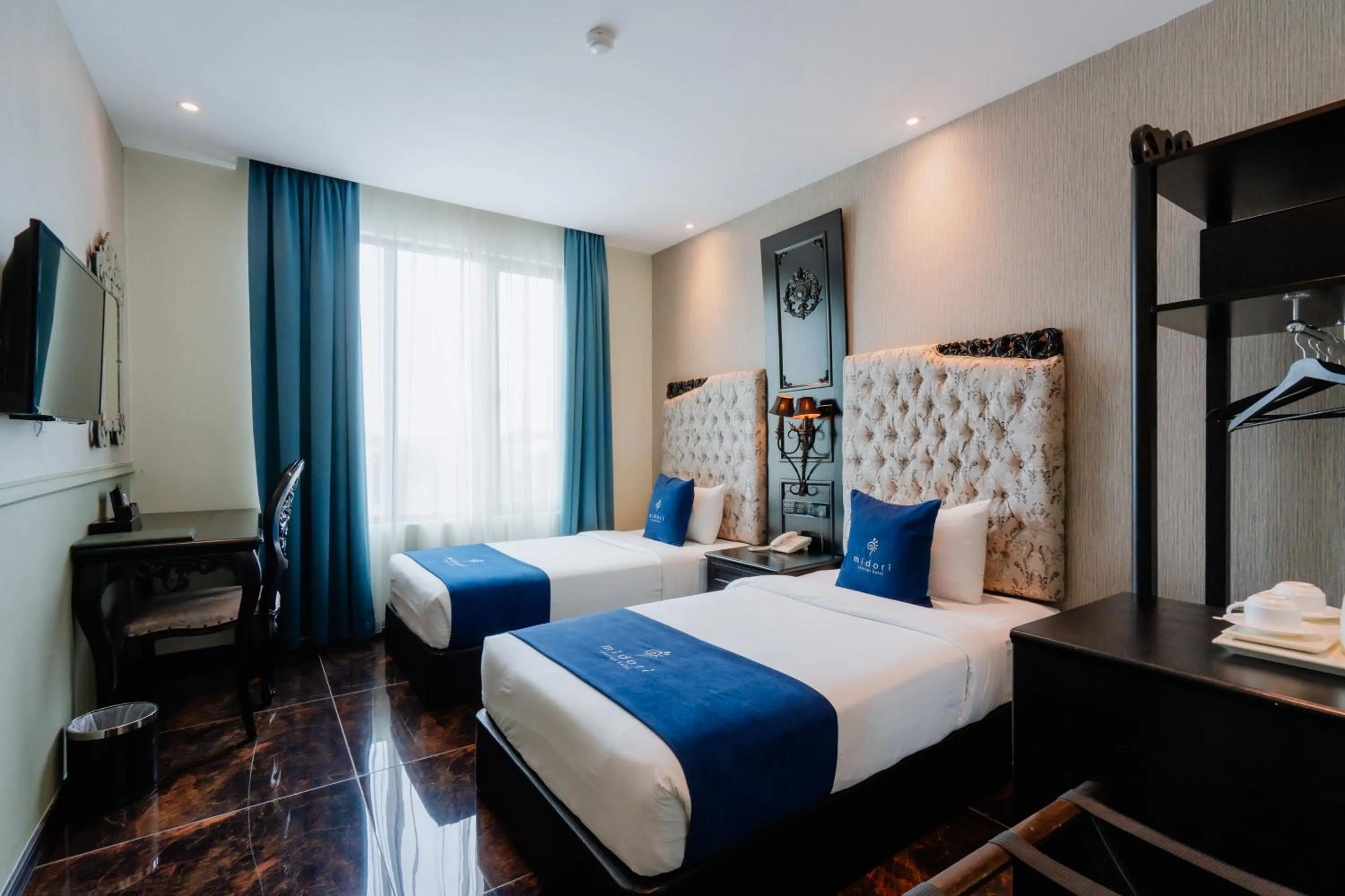 Bed in Midori Concept Hotel