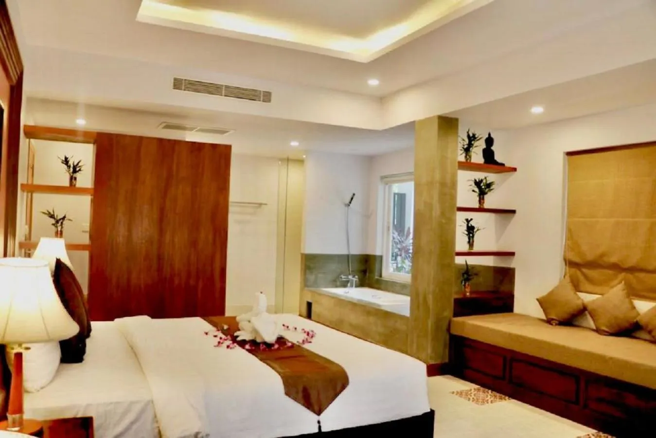 Bed in Shadow Angkor Residence