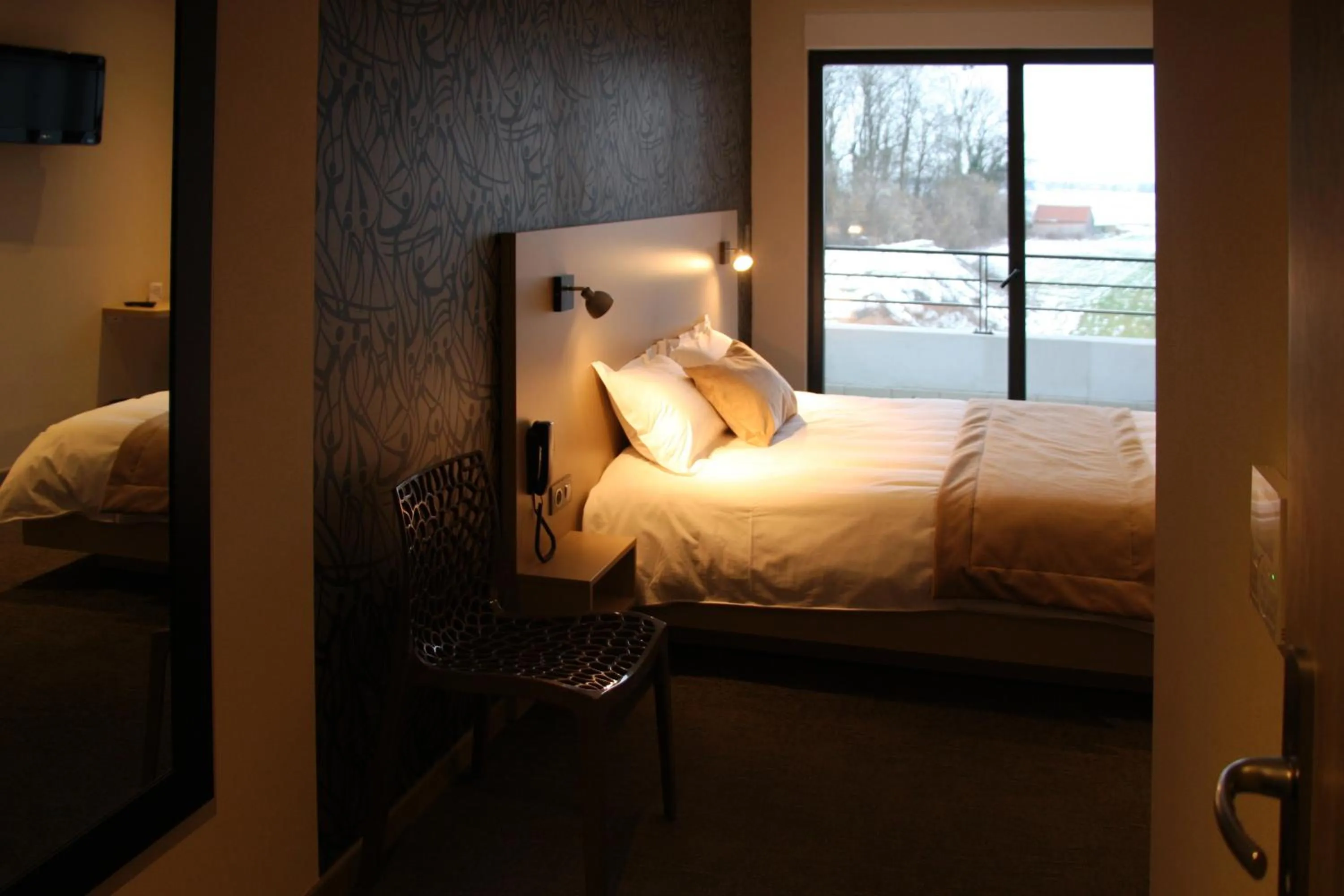 Bed in Hôtel Restaurant Les Alizés