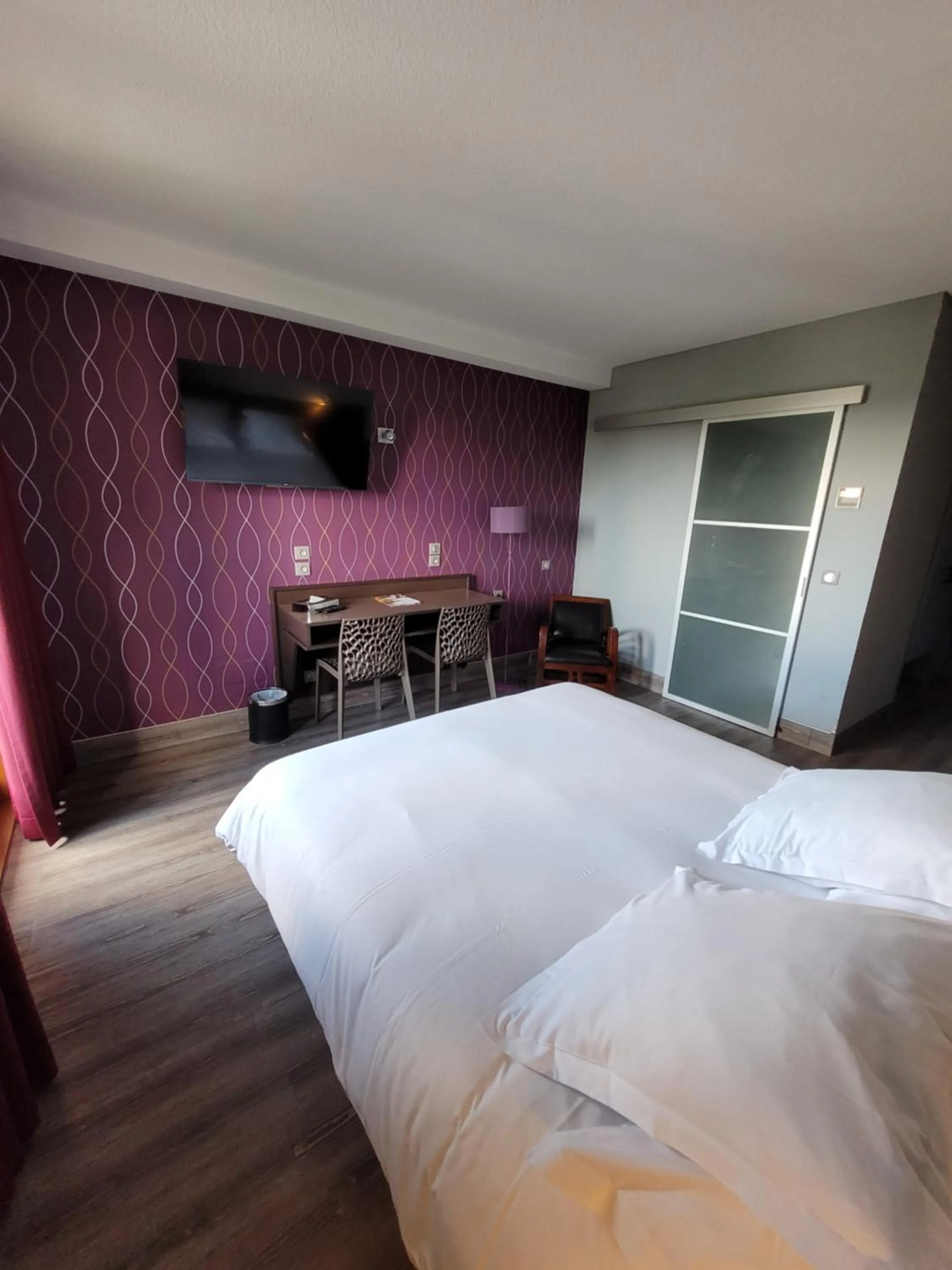 Bed in Hôtel Restaurant Les Alizés