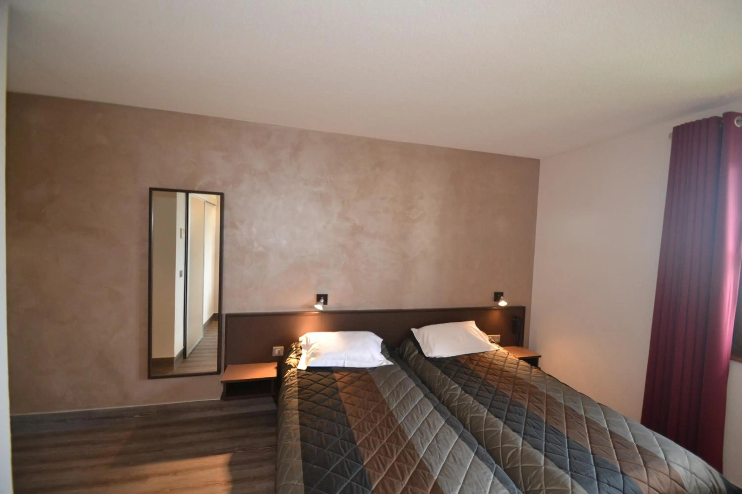 Bed in Hôtel Restaurant Les Alizés