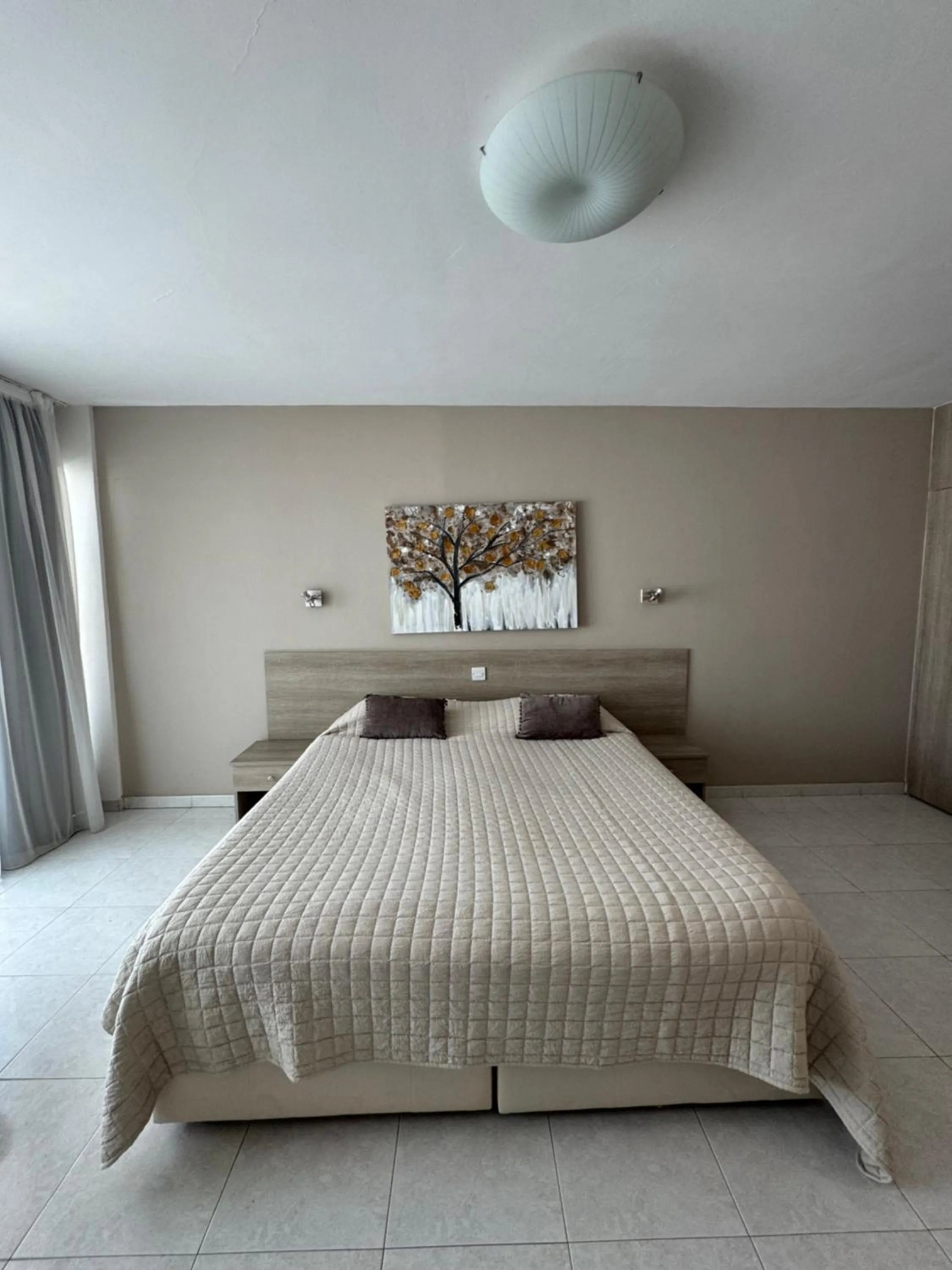 Bed in Marianna Hotel Apartments