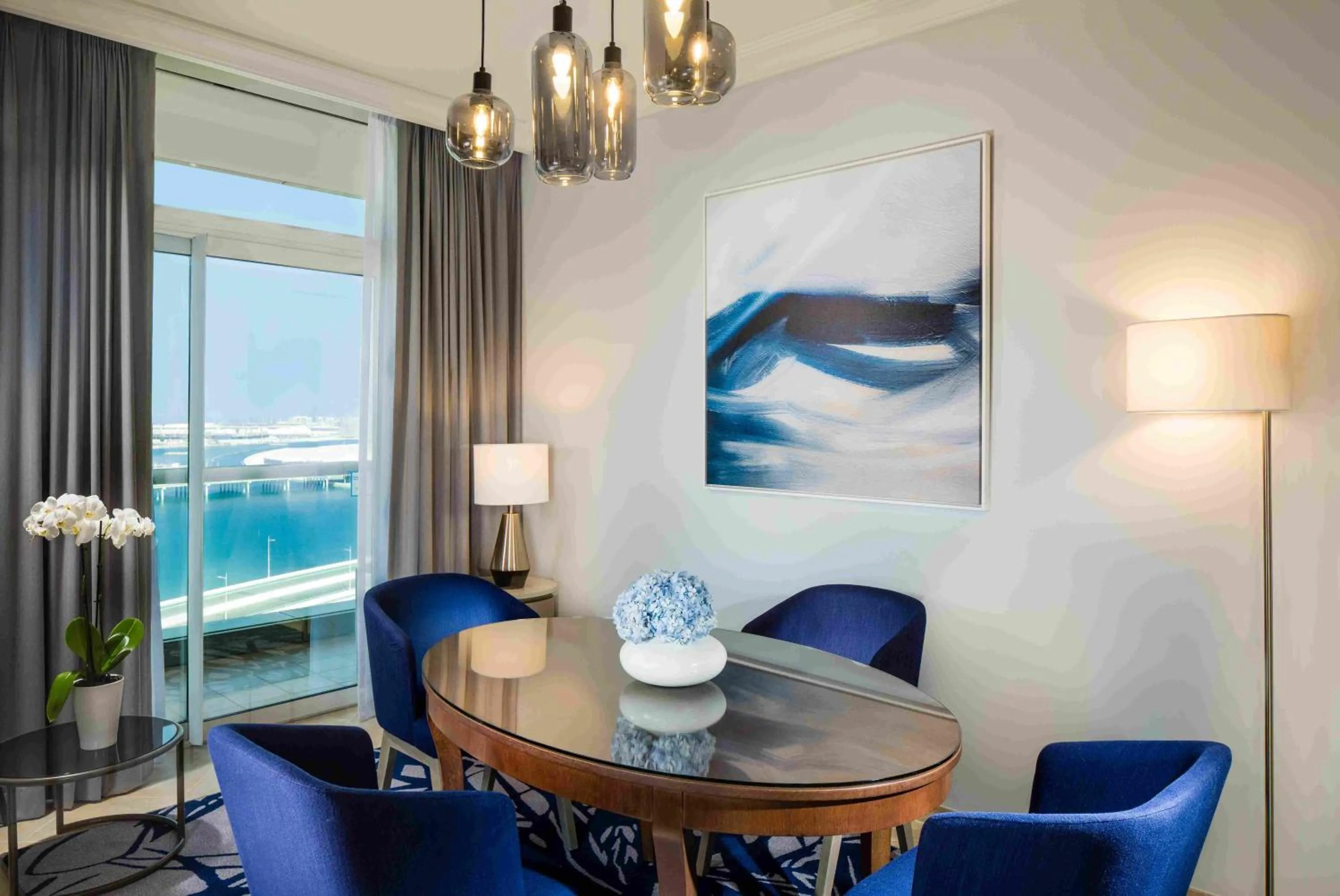 Dining area in Beach Rotana – All Suites