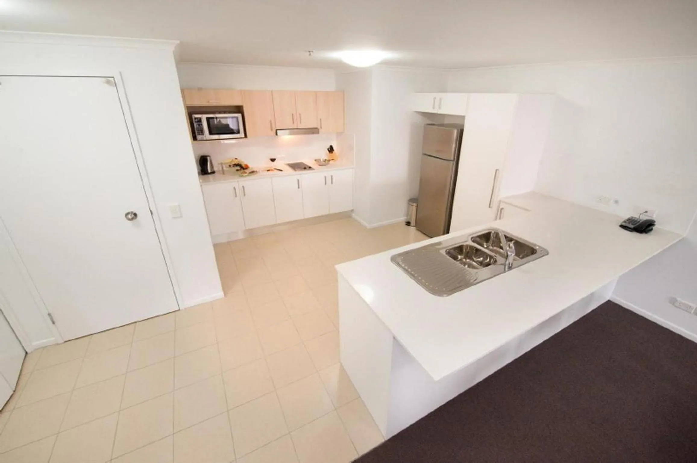 Kitchen or kitchenette in Edge Apartment Hotel