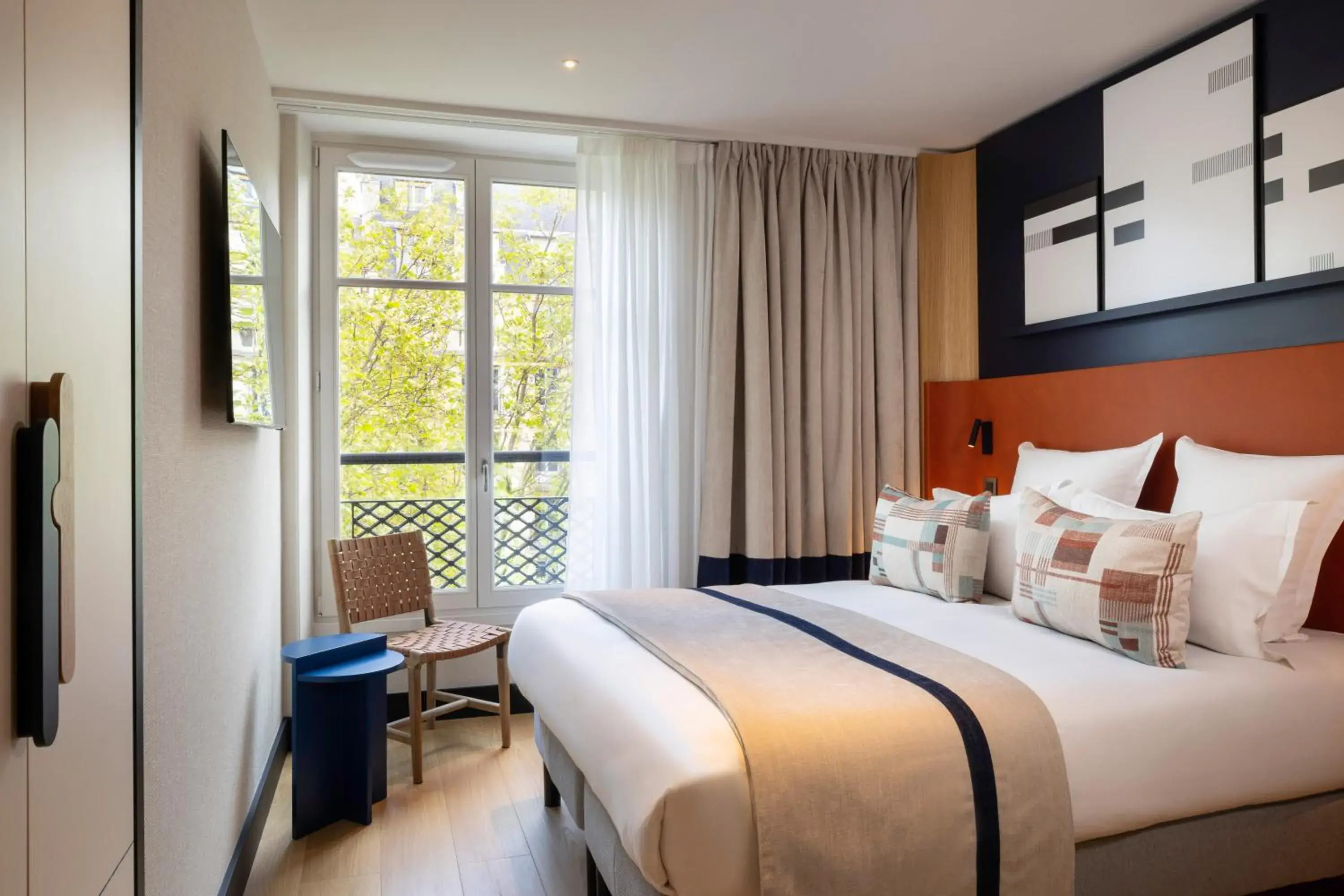 Bed in Hôtel Raspail Montparnasse Bed in Hôtel Raspail Montparnasse