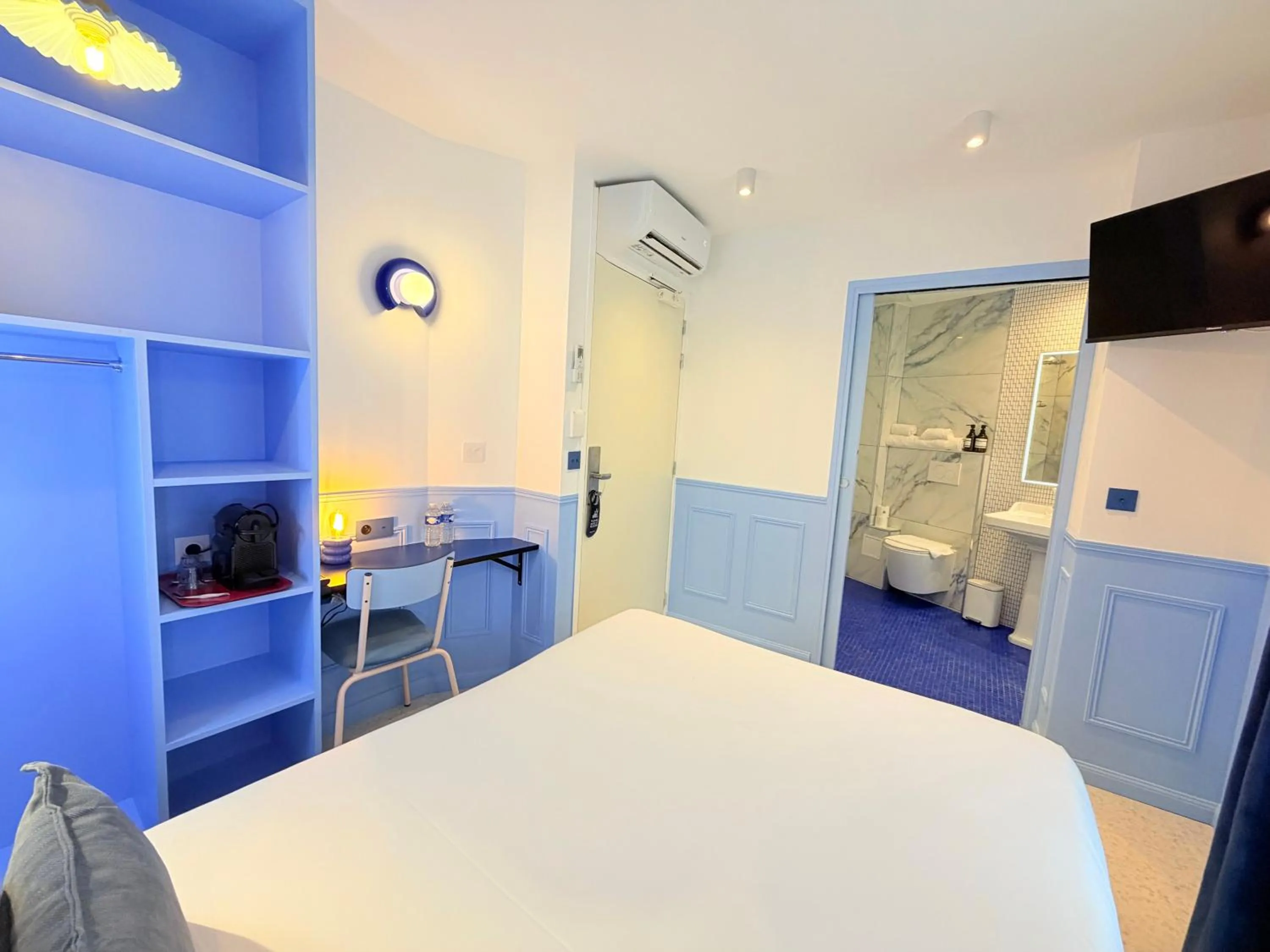 Bed in Hotel La Petite Rosa