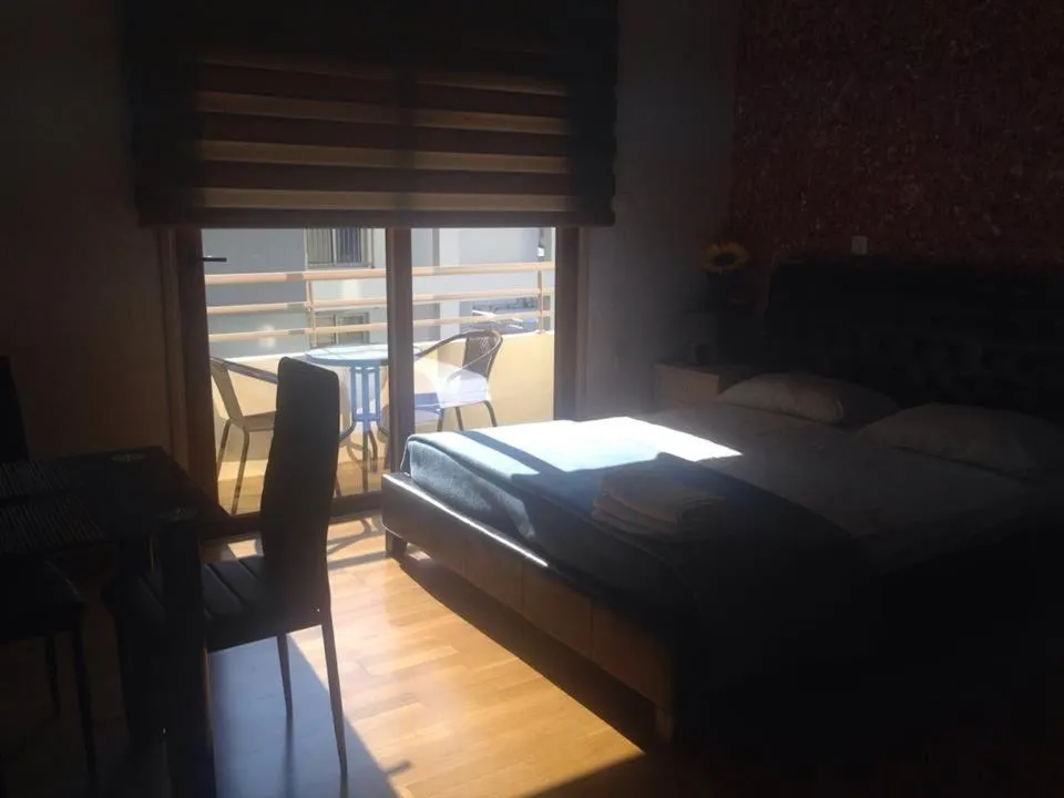 Bed in Les Palmiers Beach Boutique Hotel & Luxury Apartments