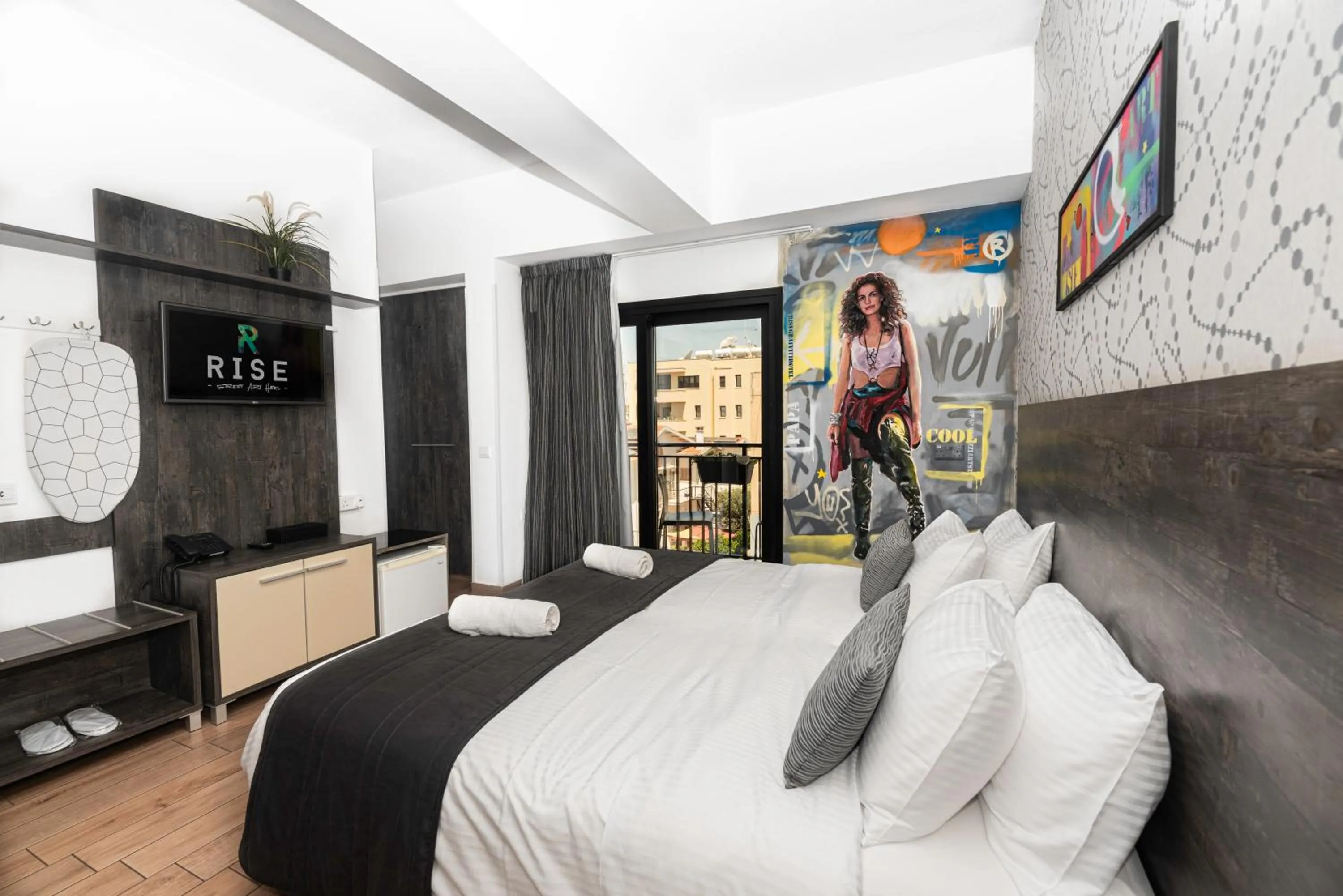 Bed in Rise Urban Art Hotel