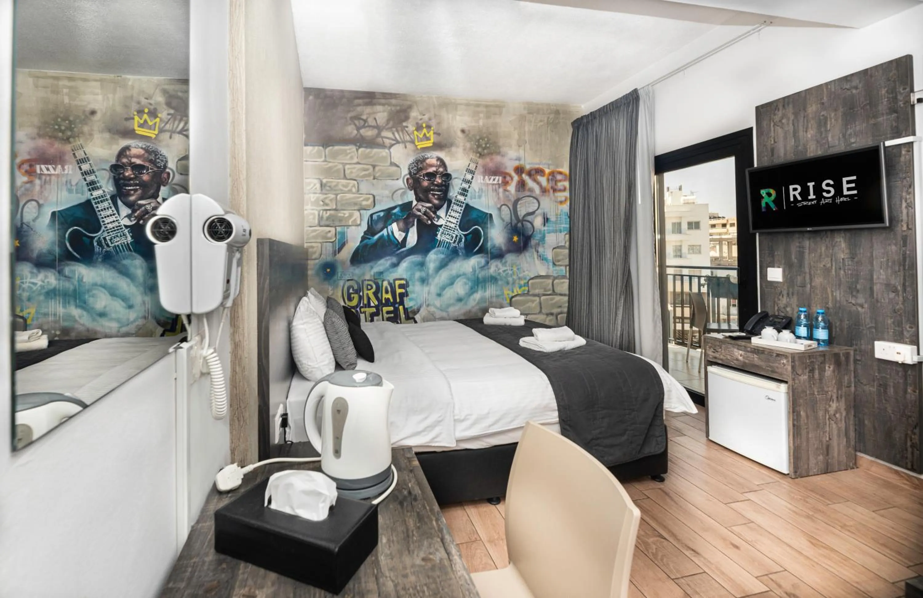 Bed in Rise Urban Art Hotel