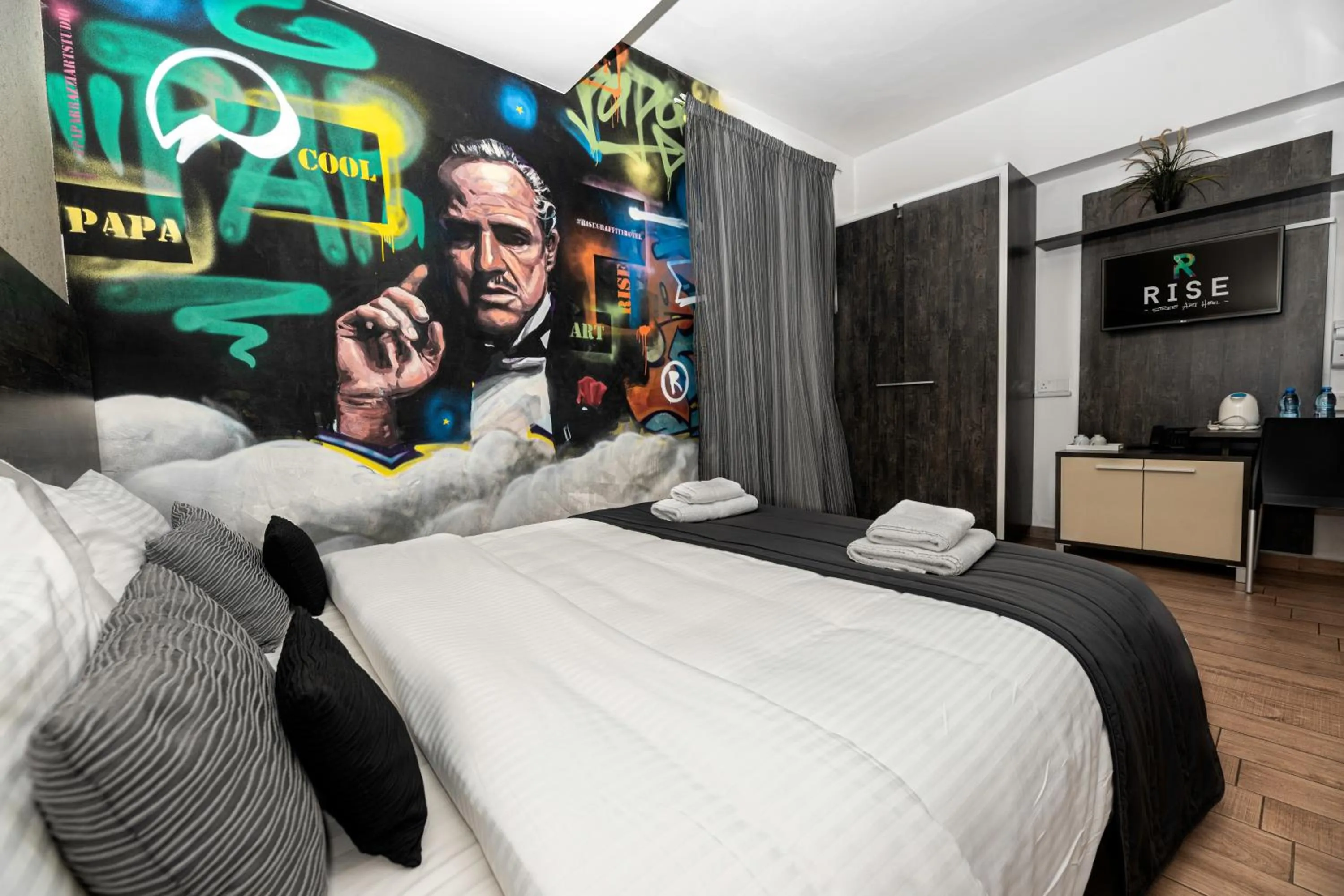 Bed in Rise Urban Art Hotel