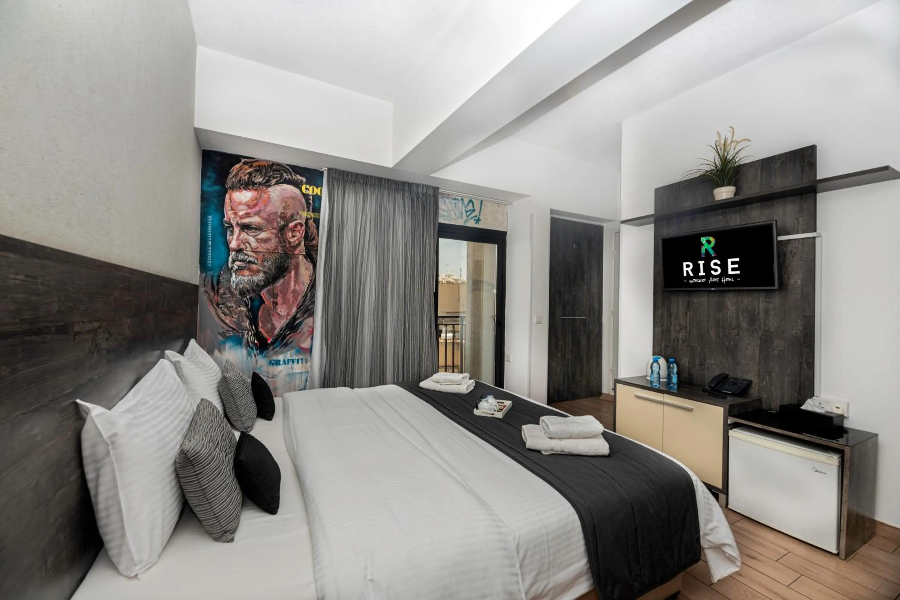 Bed in Rise Urban Art Hotel