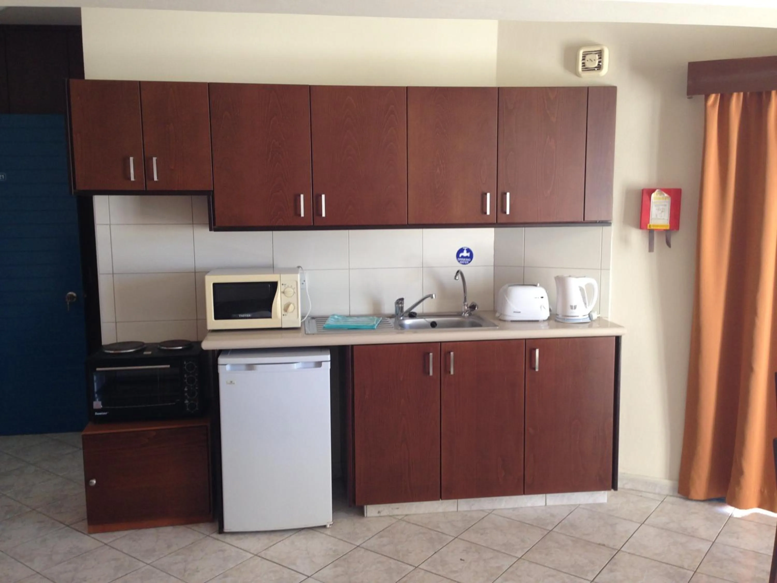 Kitchen or kitchenette in Kefalonitis Hotel Apartments