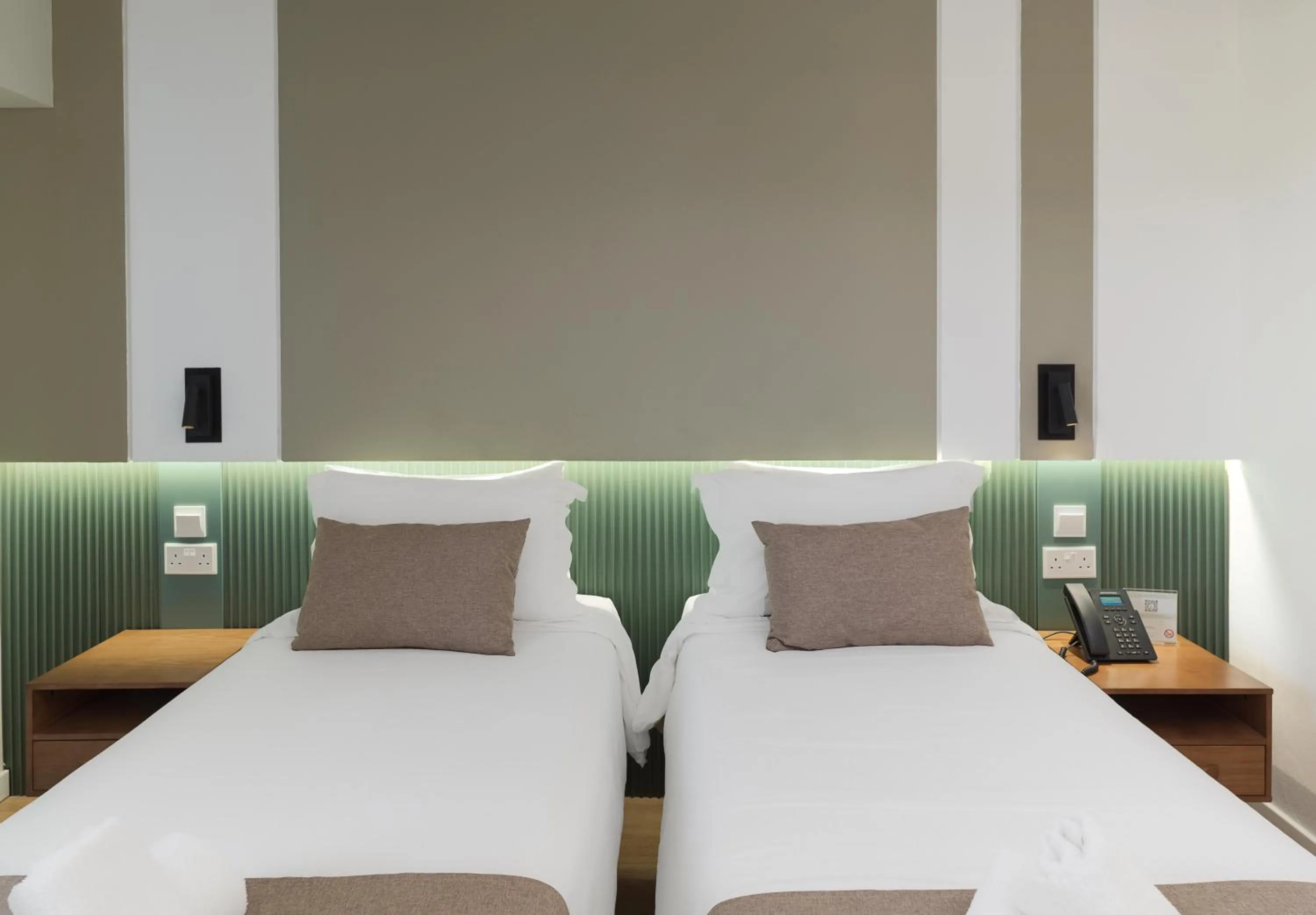 Bed in Pefkos City Hotel