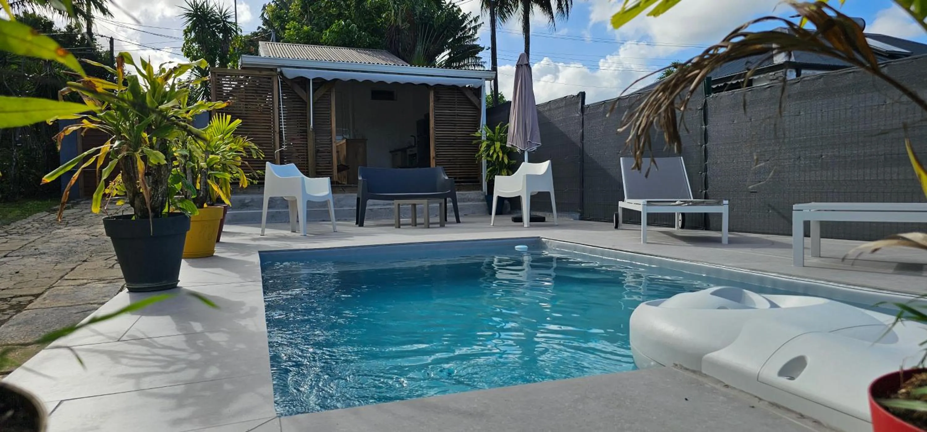 Swimming pool in Habitation Villa Les Cassias