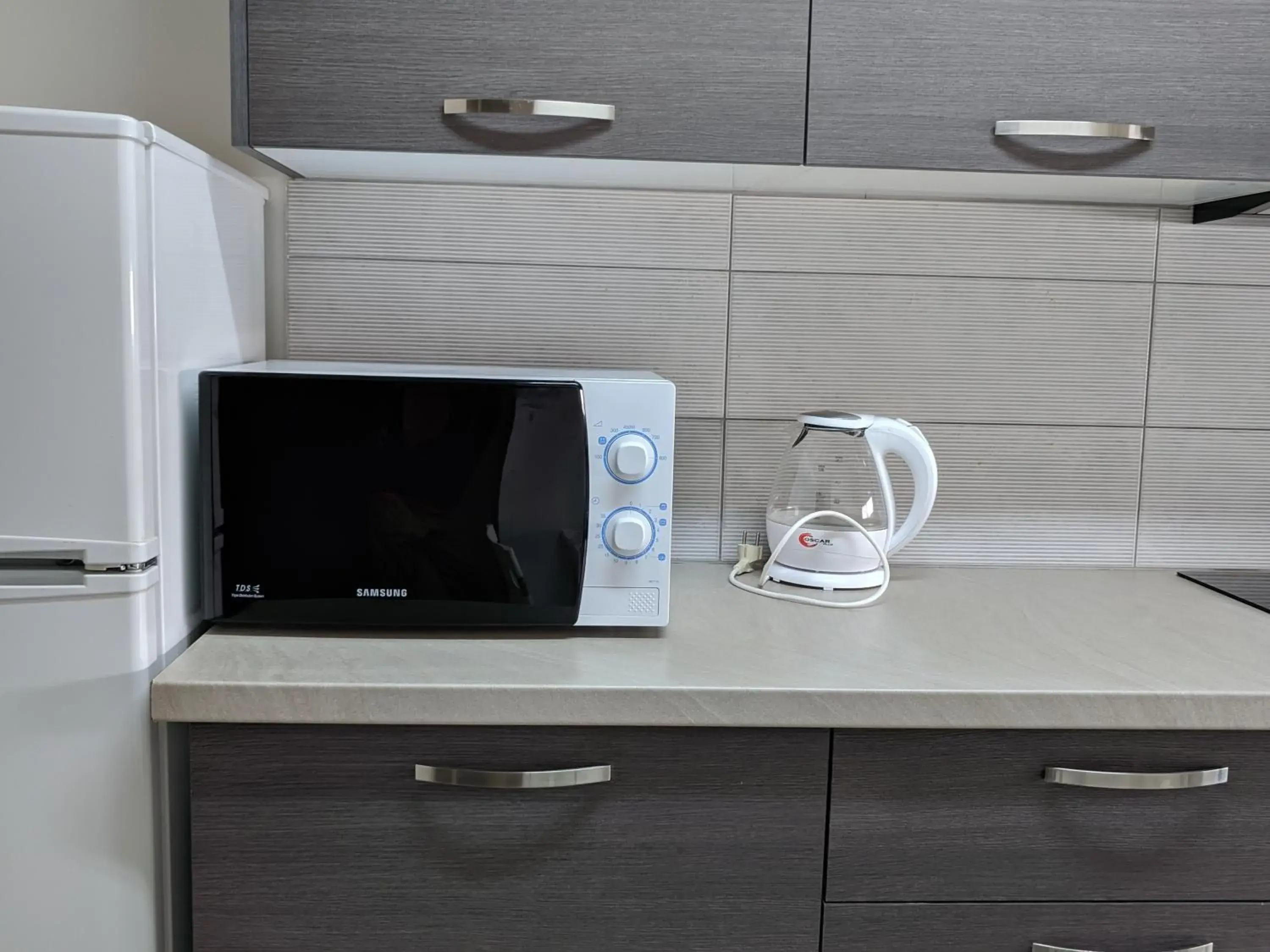 Kitchen or kitchenette, TV/Entertainment Center in Lordos Hotel Apartments Nicosia