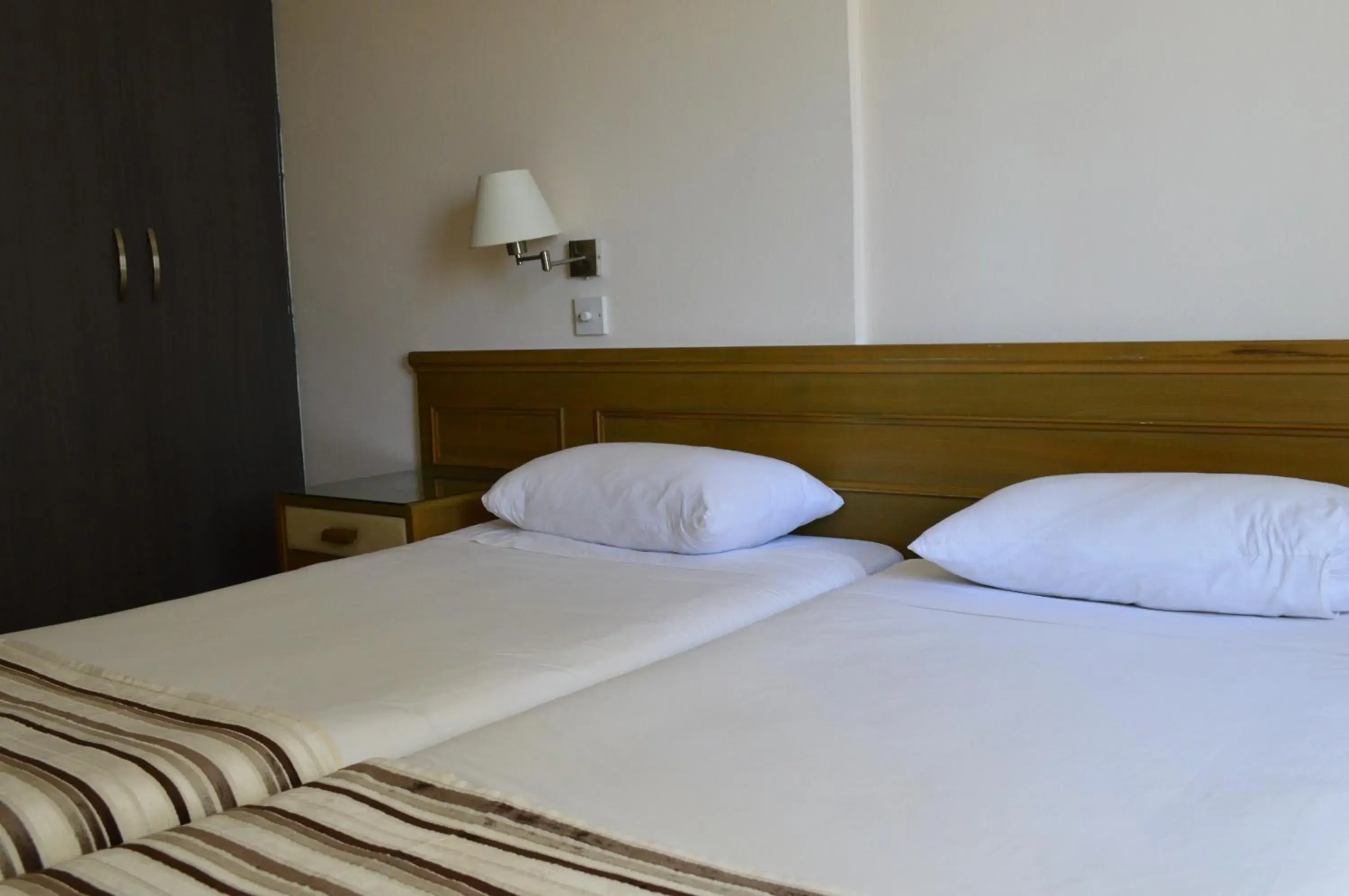 Bed in Lordos Hotel Apartments Nicosia