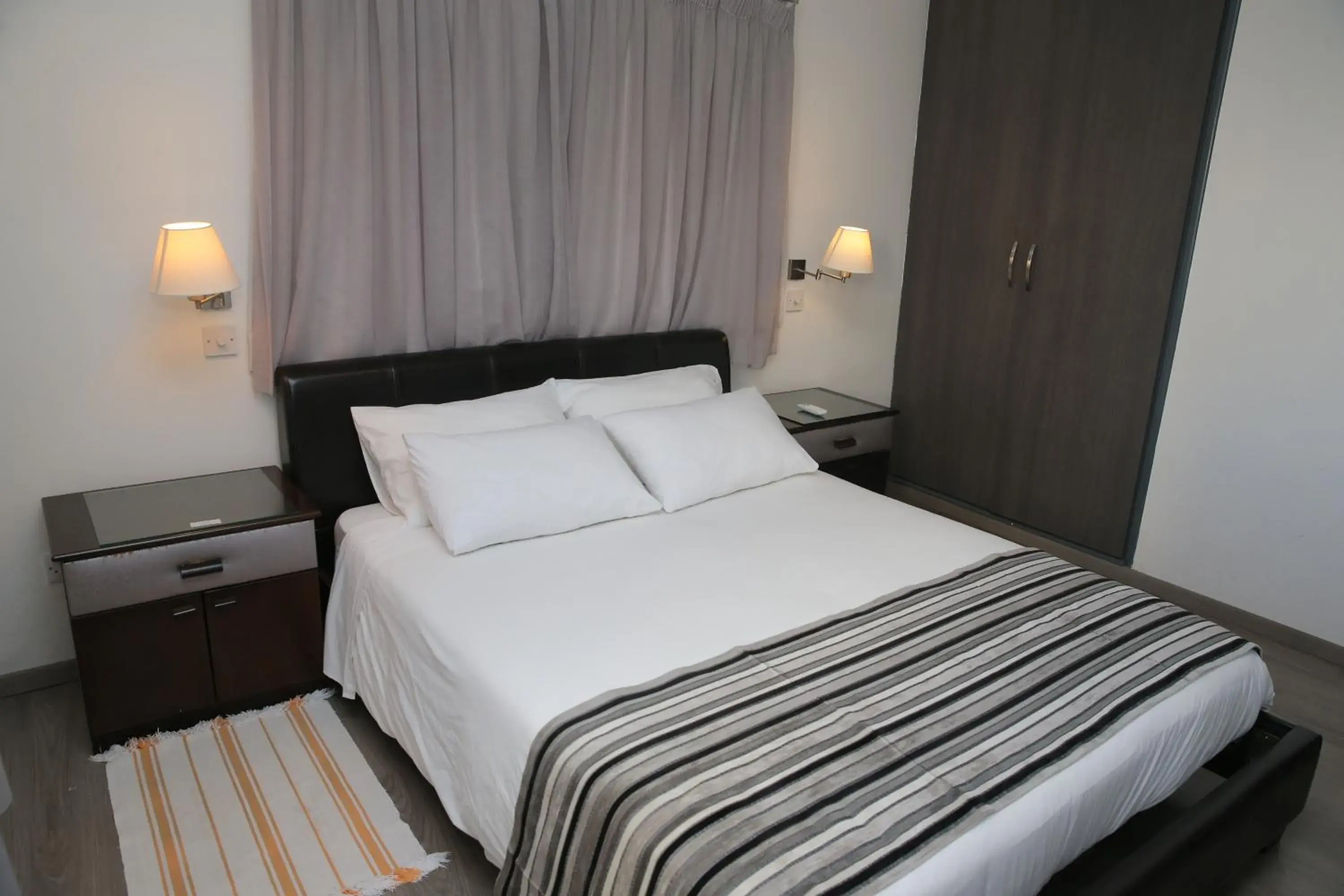 Bed in Lordos Hotel Apartments Nicosia