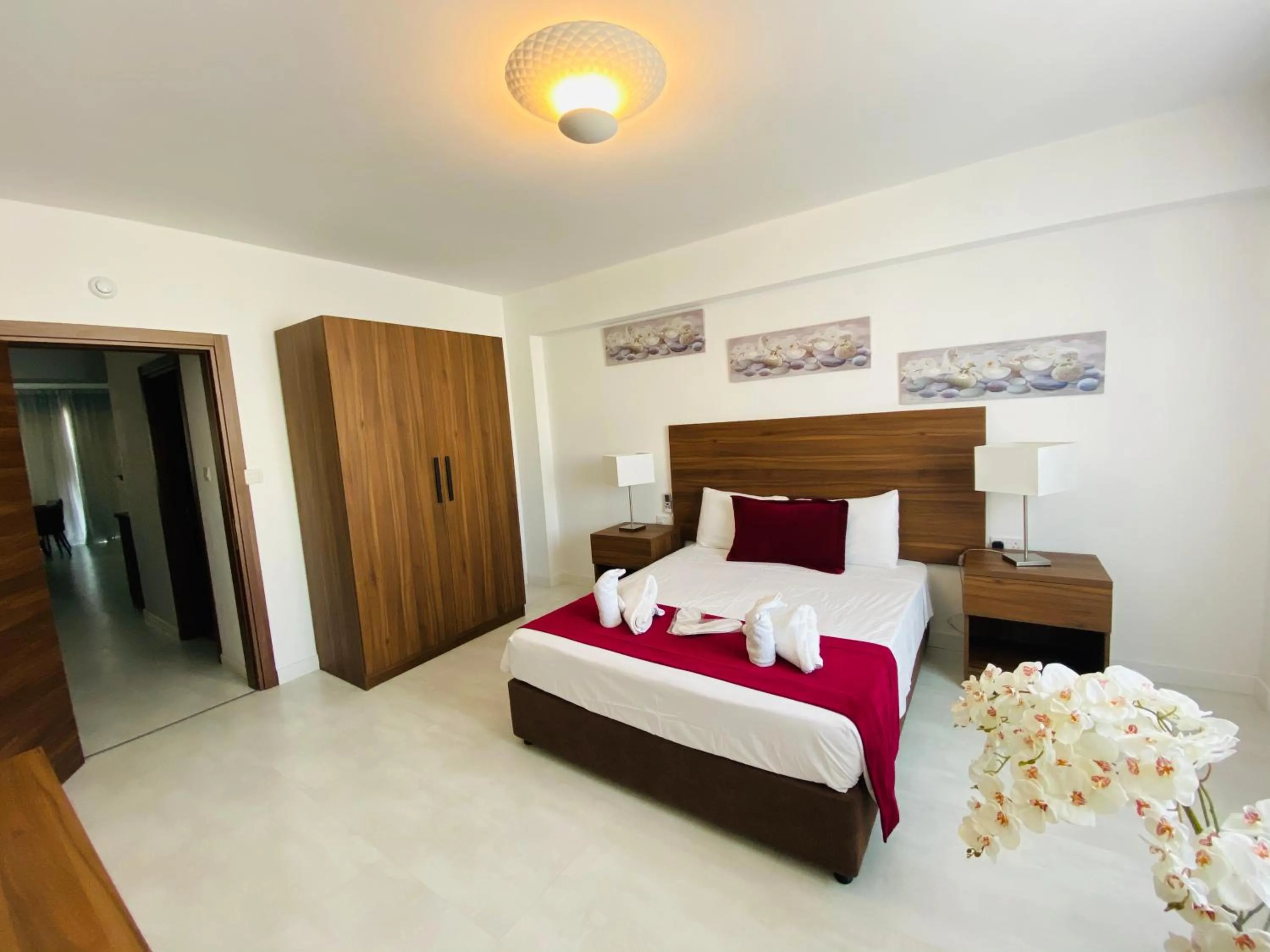 Bed in Eleonora Hotel Apartments