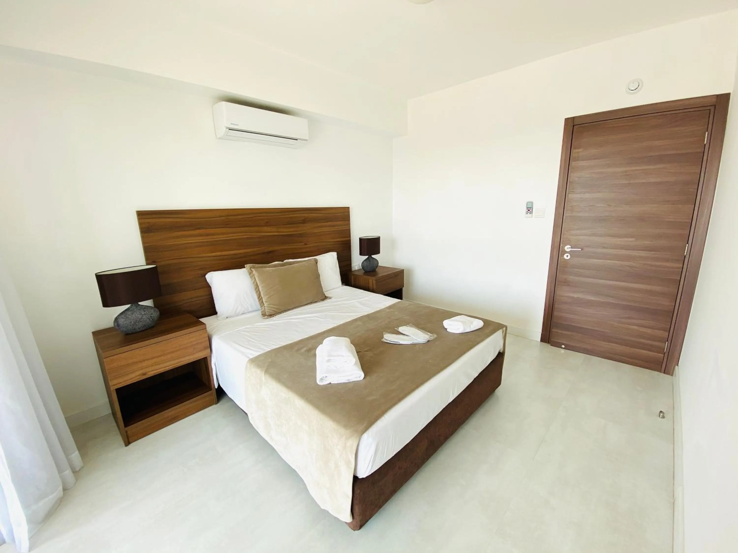 Bed in Eleonora Hotel Apartments