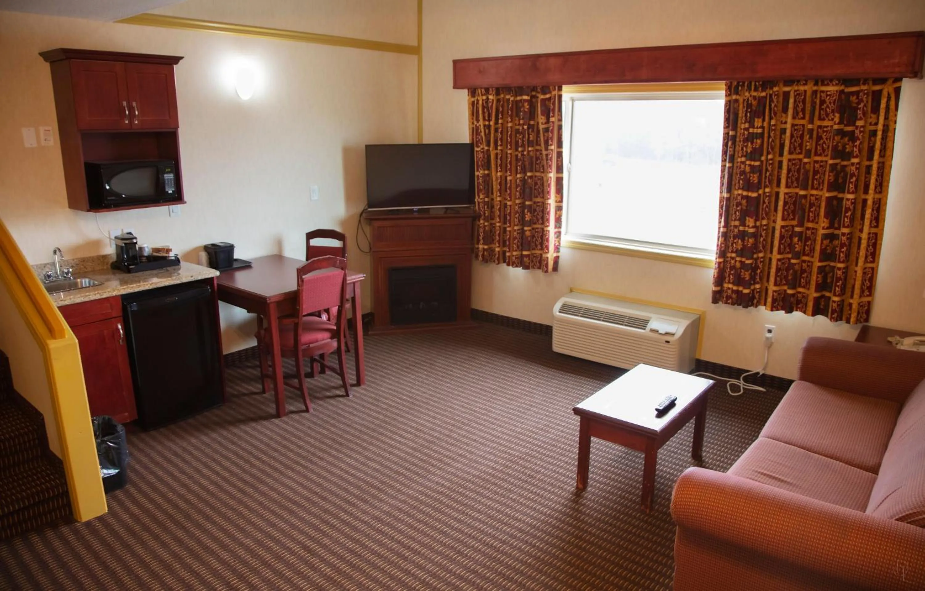 Living room in All Stay Suites