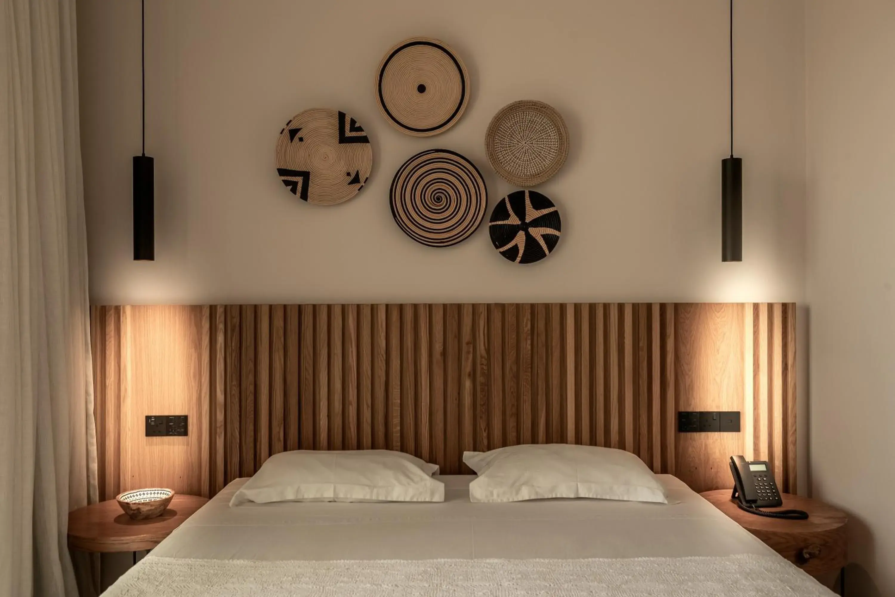 Bed in Anemi Hotel & Suites Bed in Anemi Hotel & Suites