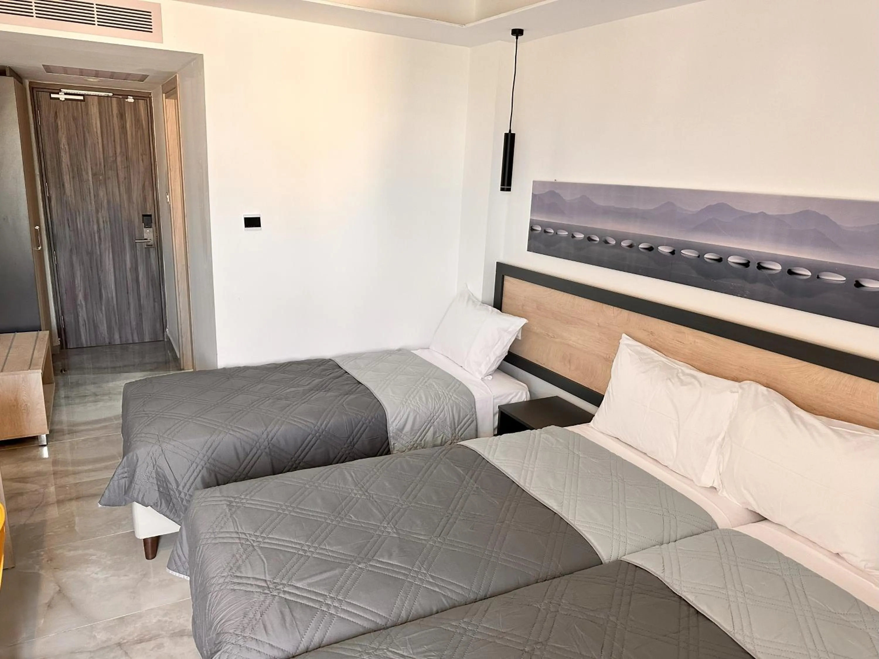 Bed in Papouis Protaras Hotel