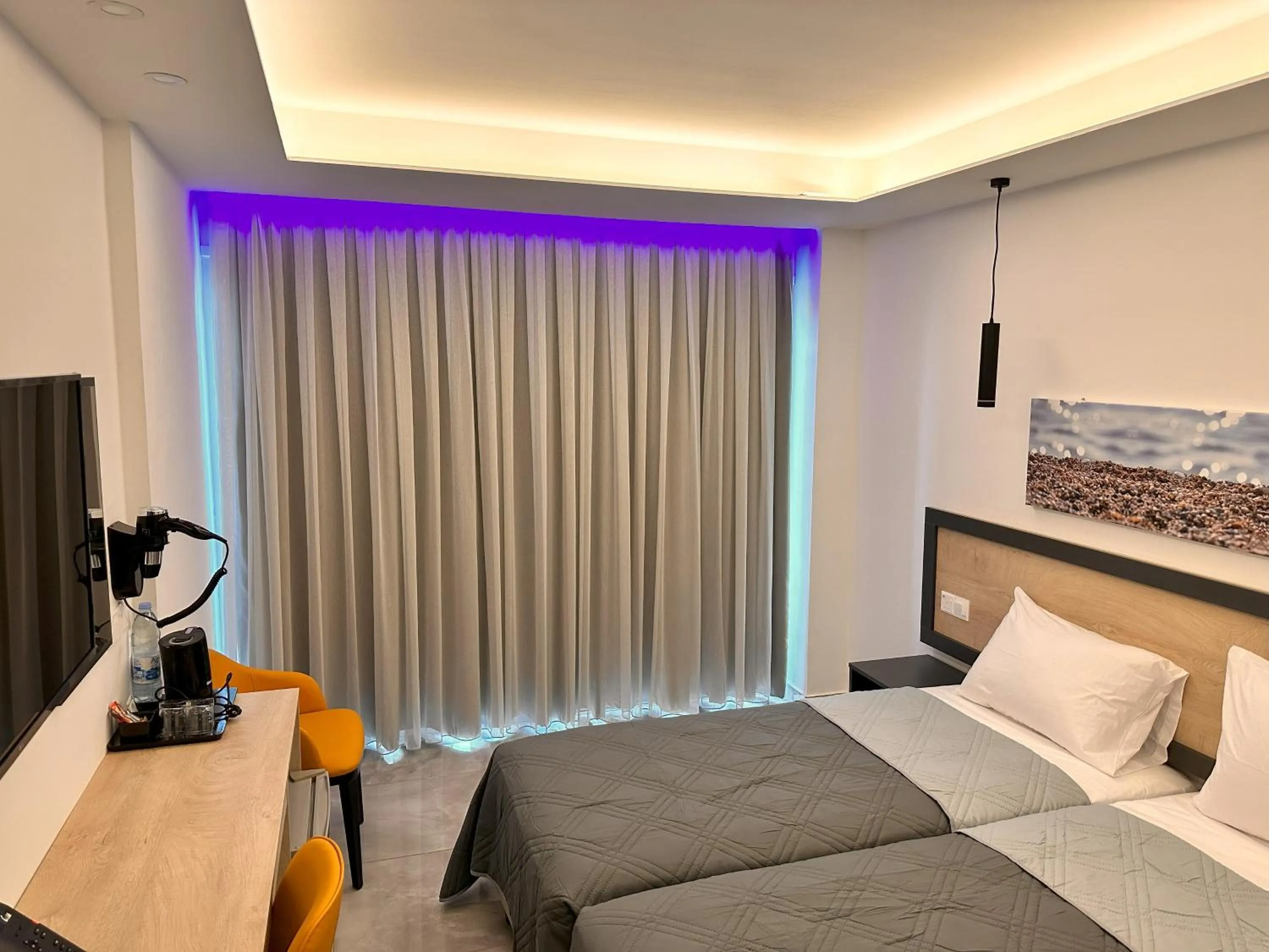 Bed in Papouis Protaras Hotel