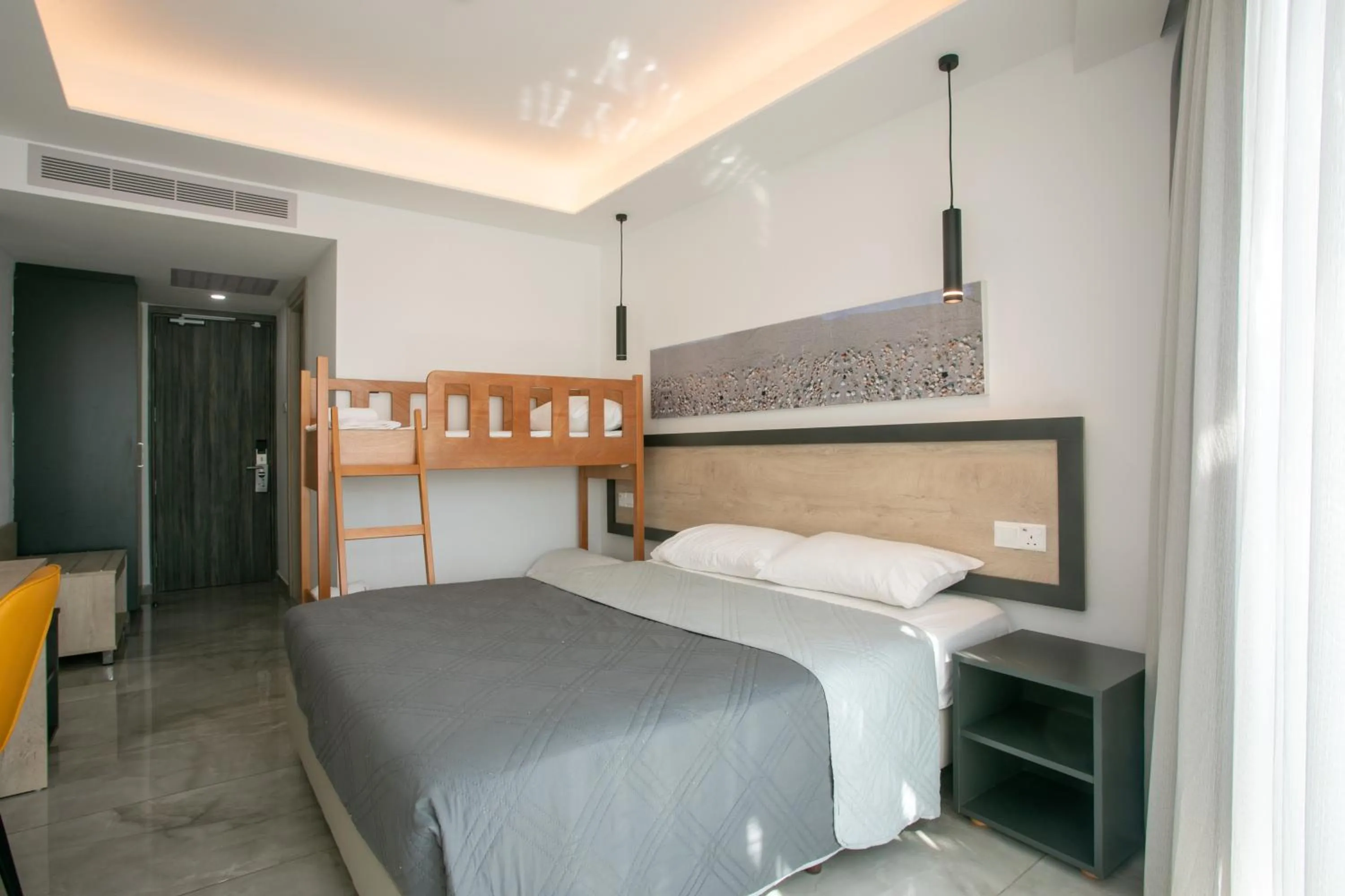 Bed in Papouis Protaras Hotel