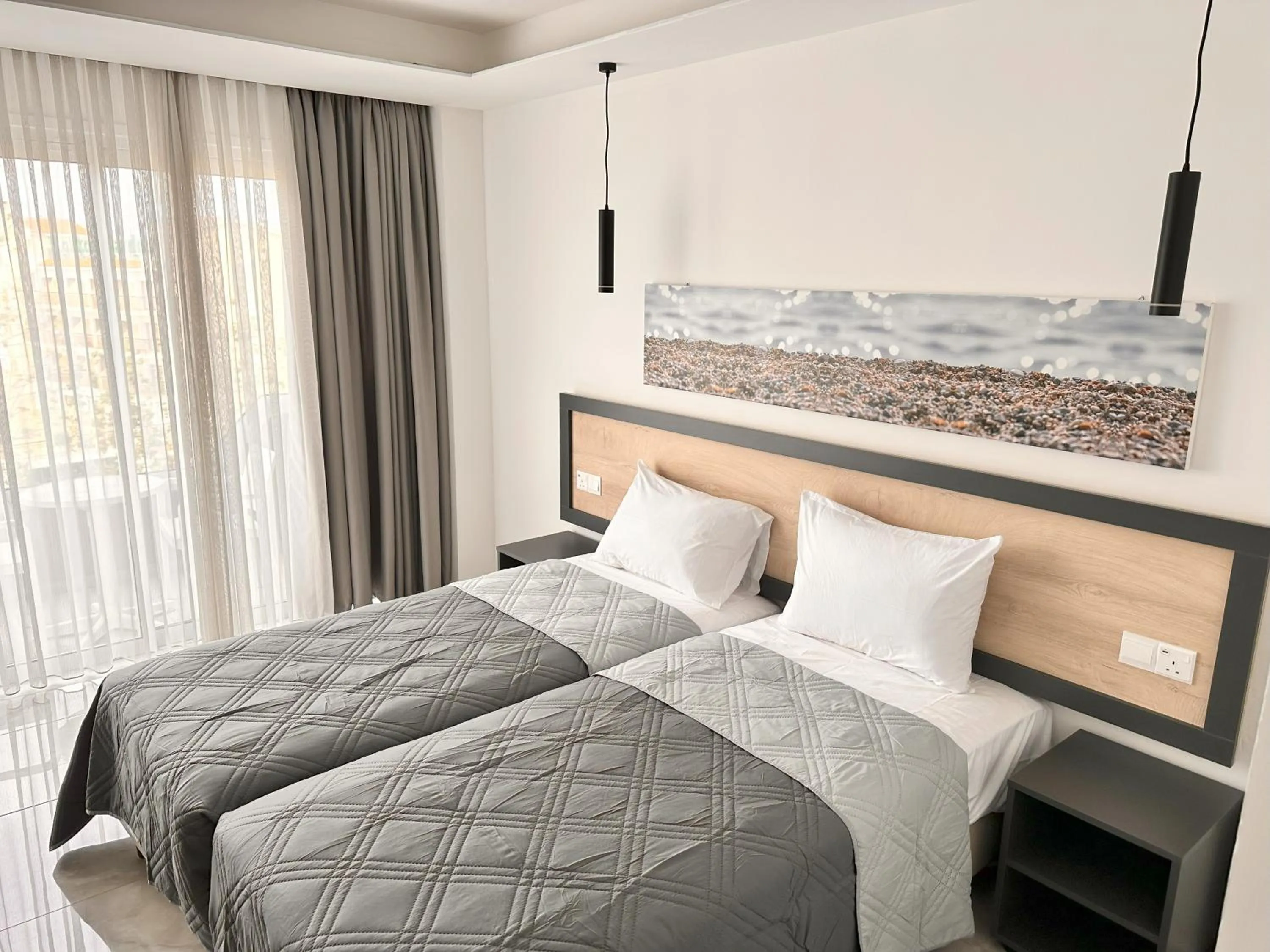 Bed in Papouis Protaras Hotel