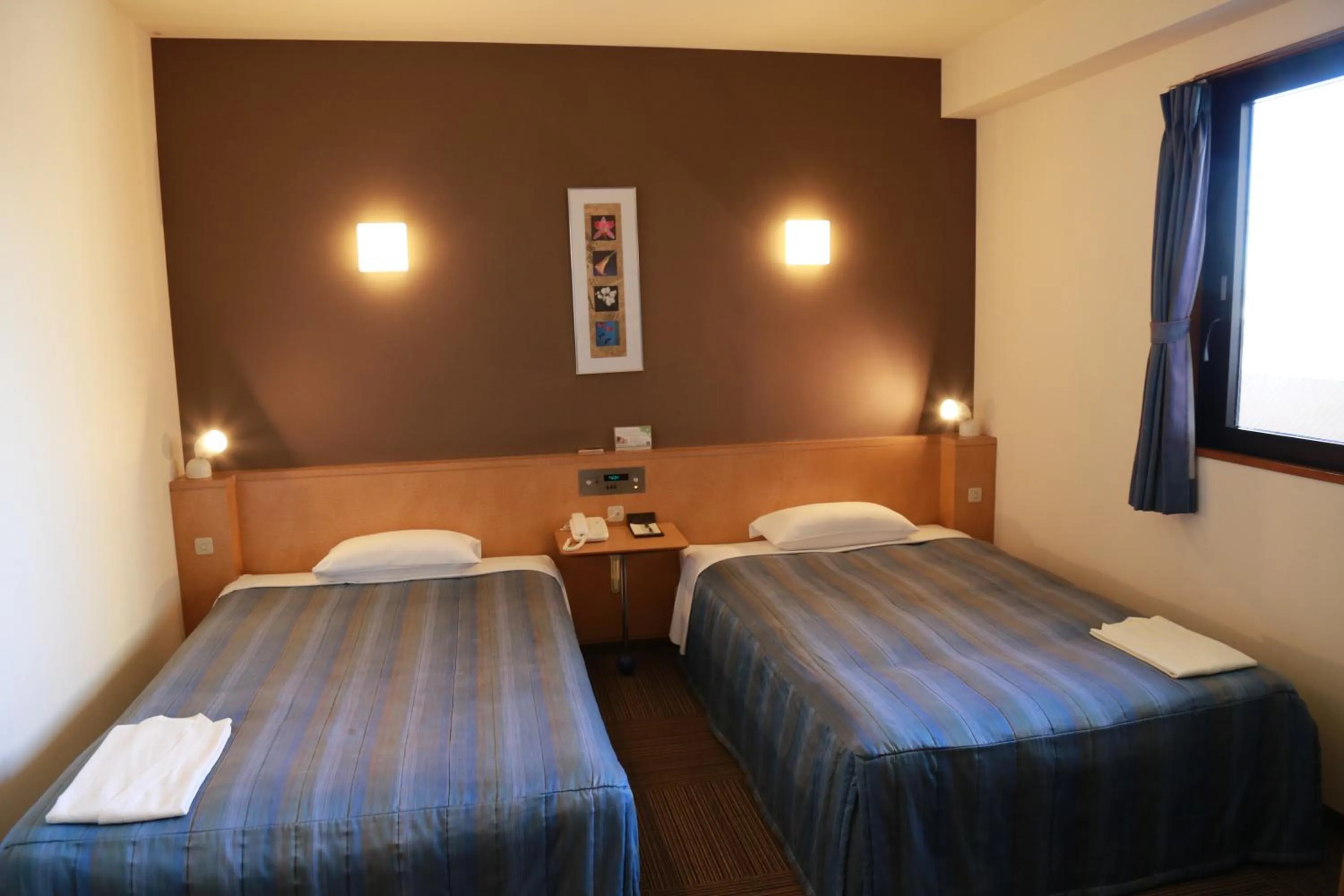 Bed in Hotel Plaza Arakawaoki